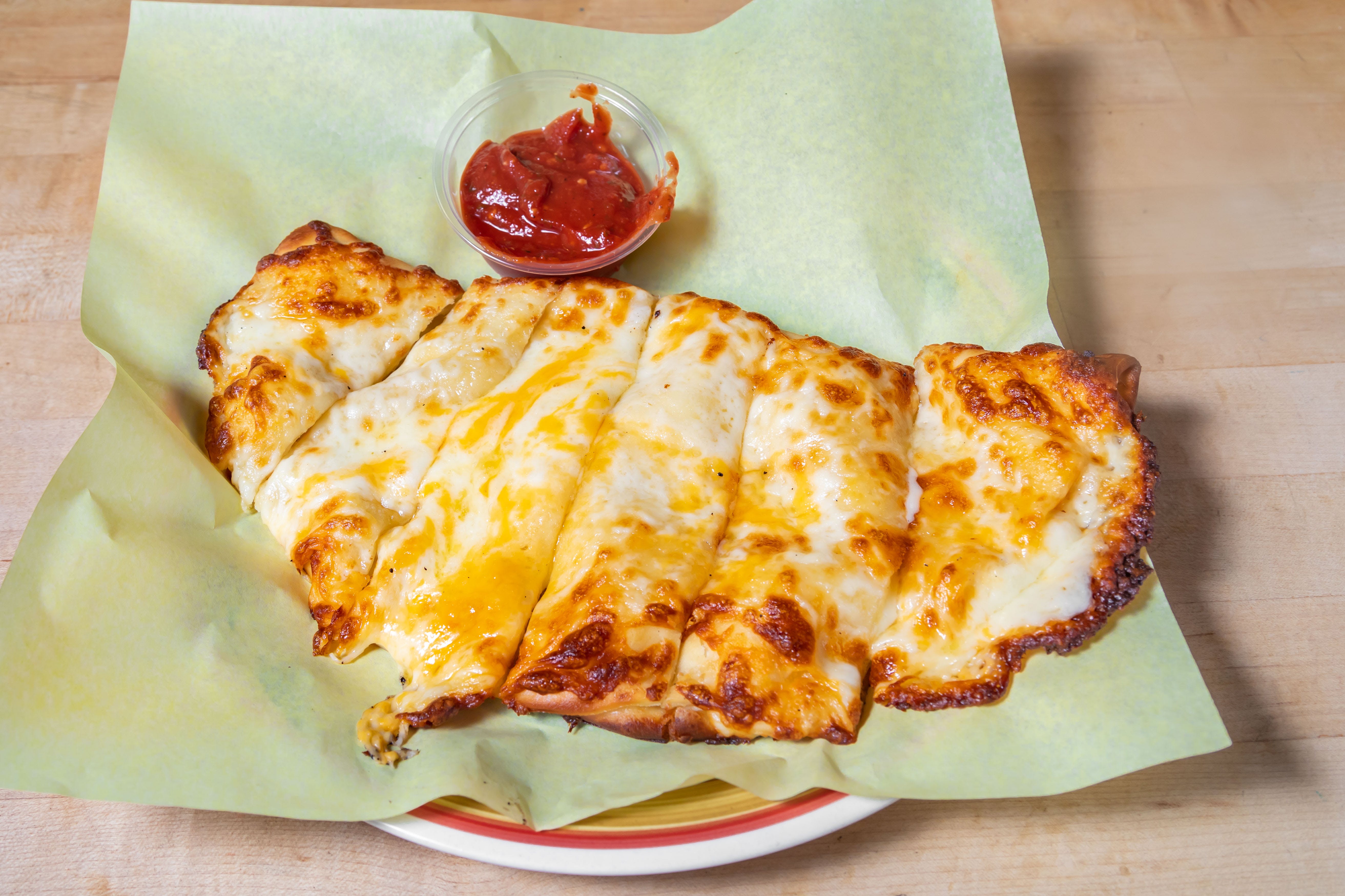 Order Cheesy Bread - Appetizer food online from Firehouse Pizzeria store, San Francisco on bringmethat.com