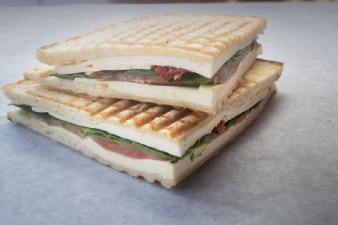 Order 4. Tuscan Panini food online from West Village Finest Deli store, New York on bringmethat.com