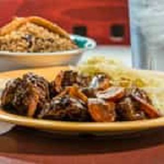 Order Oxtails (Large) food online from Caribbean Hut store, Charlotte on bringmethat.com