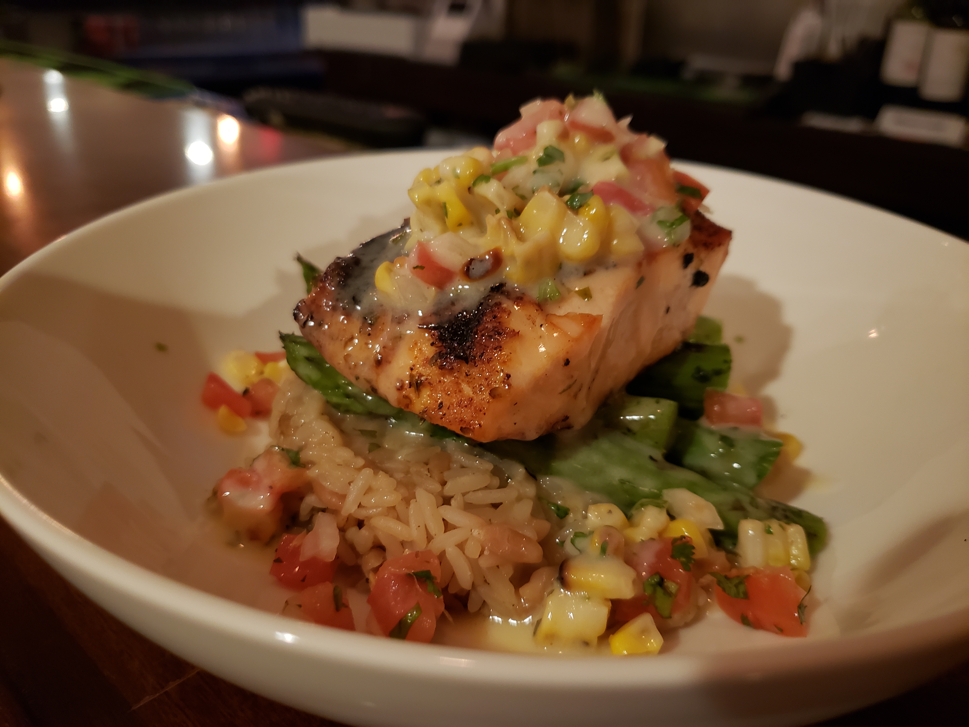 Order Grilled Salmon with Black Corn Salsa food online from Rivieras Tapas store, Riverdale Park on bringmethat.com