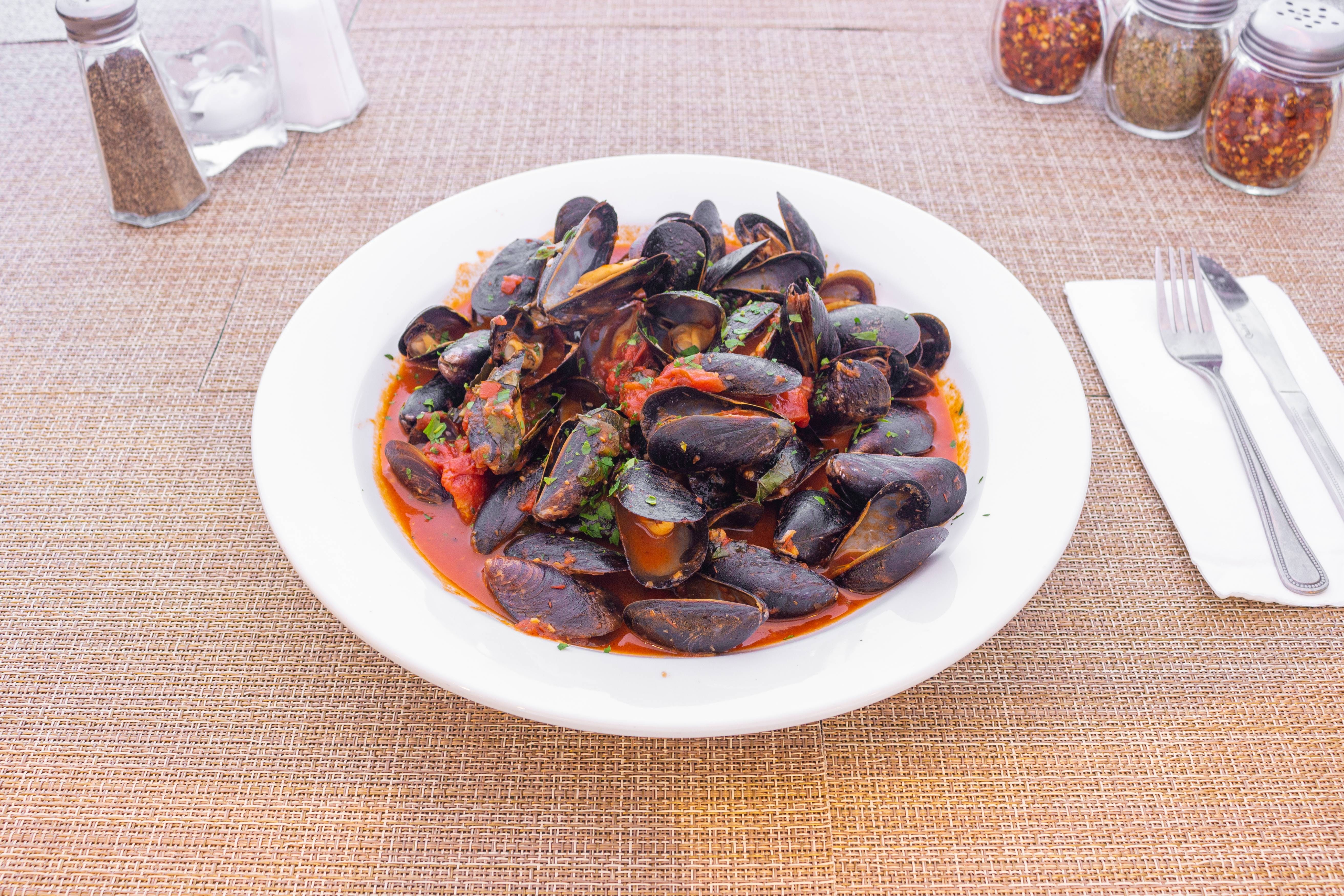 Order PEI Mussels - Small food online from Pizza Man Trattoria Italiano store, Pompton Plains on bringmethat.com