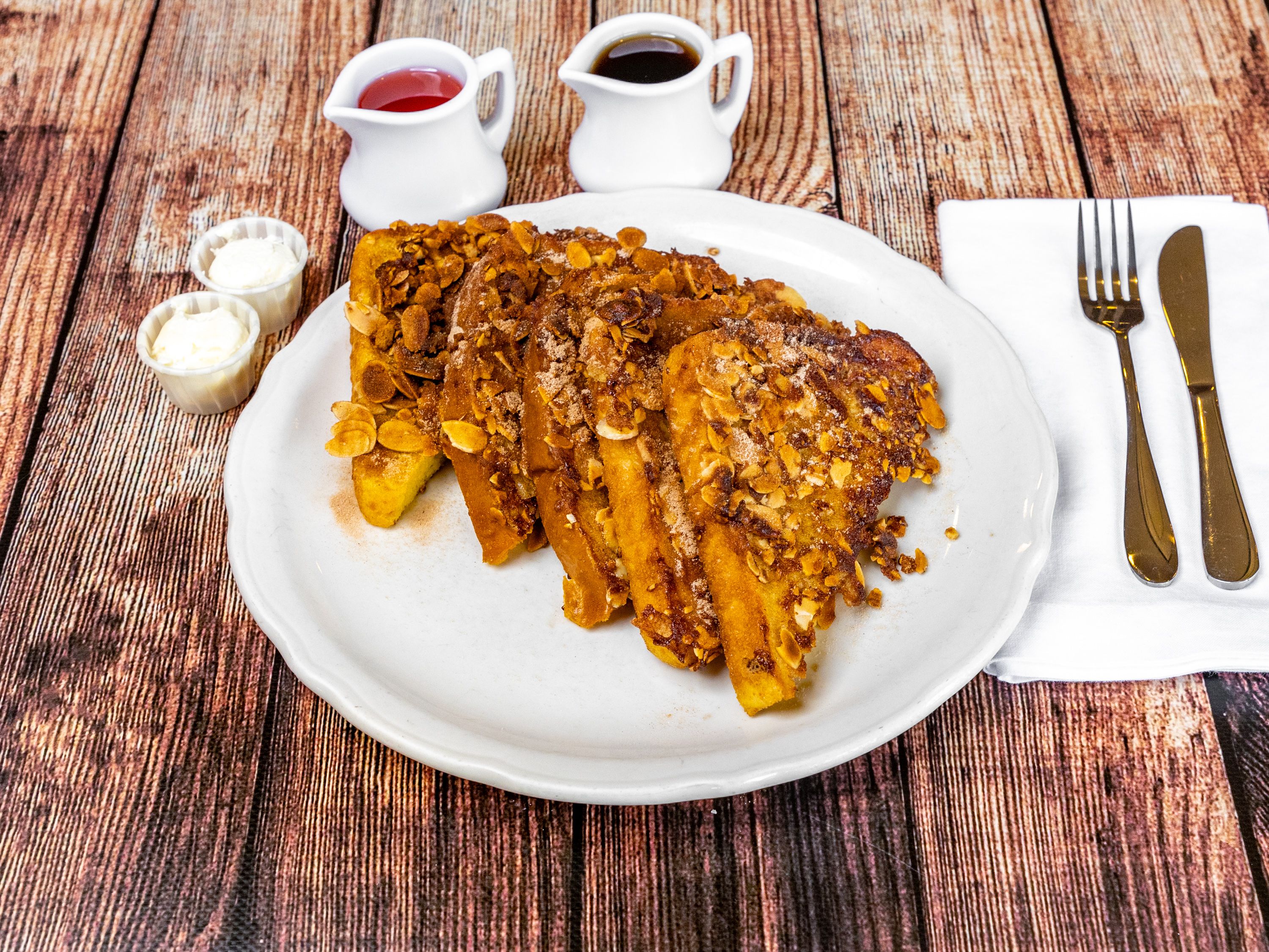 Order Cinnamon Almond French Toast food online from The Original Pancake House store, Norco on bringmethat.com