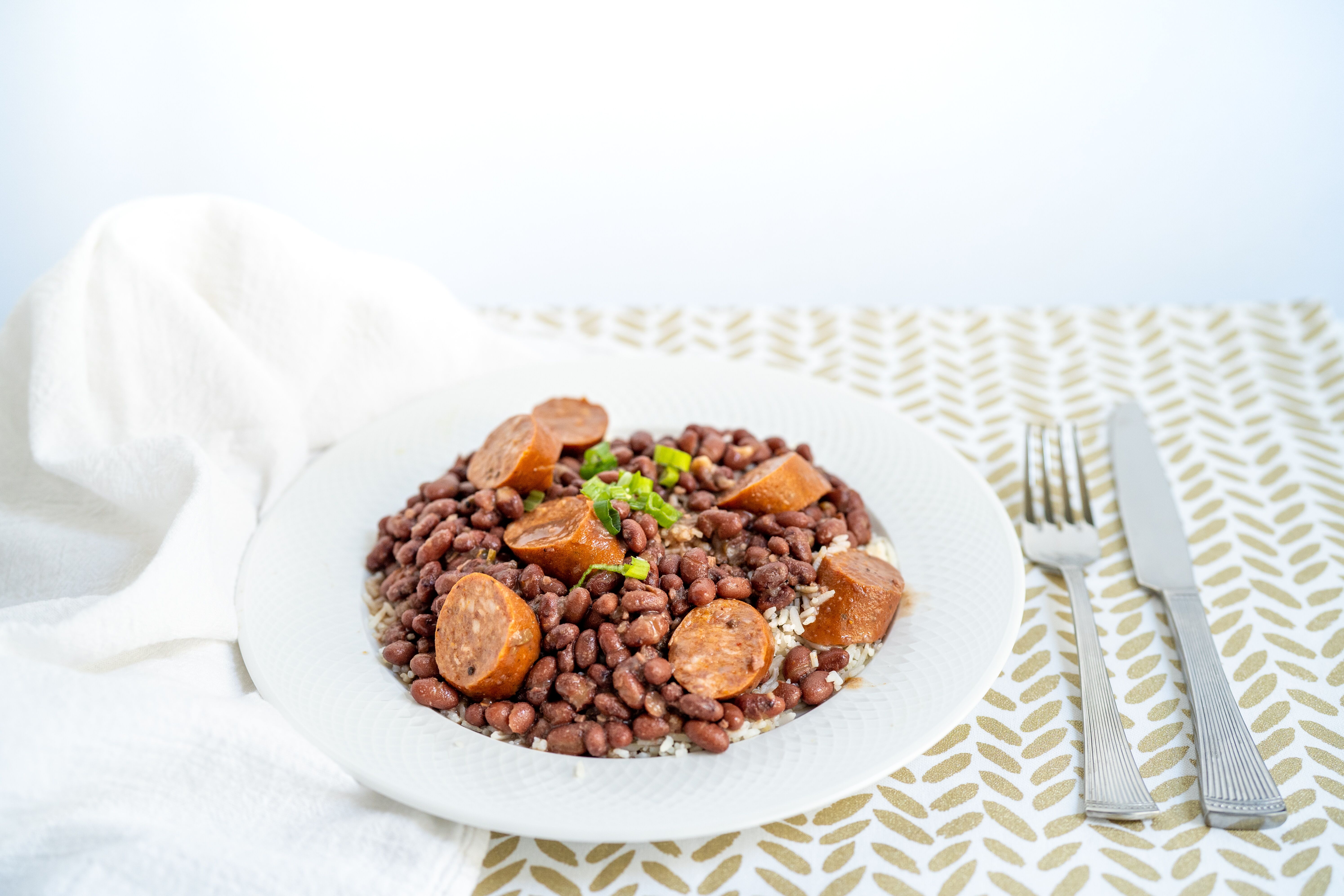 Order Red Beans with Rice and Sausage food online from 5 Buck Menu store, Tempe on bringmethat.com