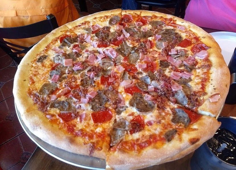 Order Meat Lovers Pizza - Personal 12" food online from Bella Napoli Pizzeria & Italian Grill store, Durham on bringmethat.com