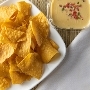 Order C- Chips & Queso food online from Zandra Taqueria store, Manassas on bringmethat.com