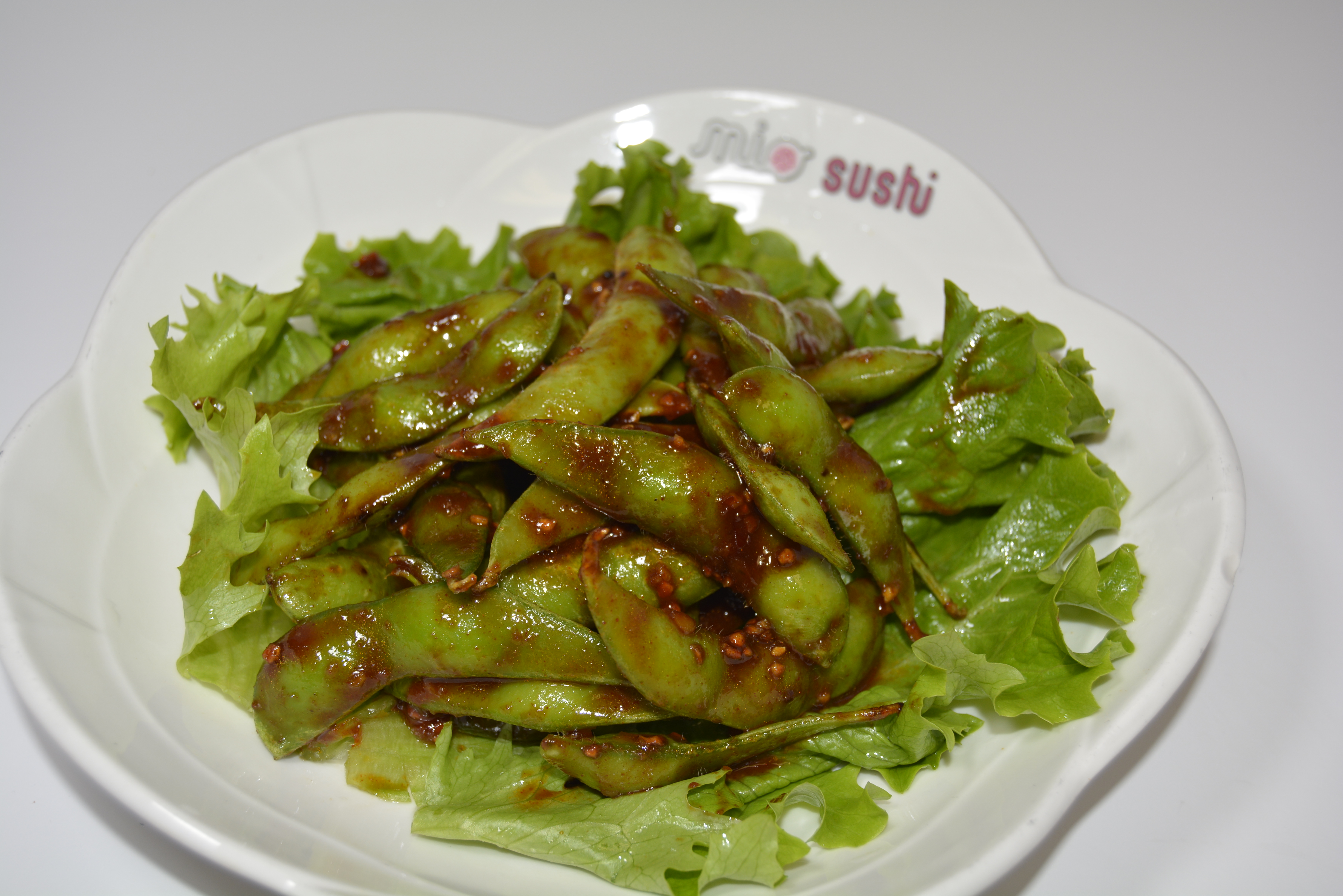 Order Spicy Garlic Edamame food online from Mio Sushi store, Bend on bringmethat.com