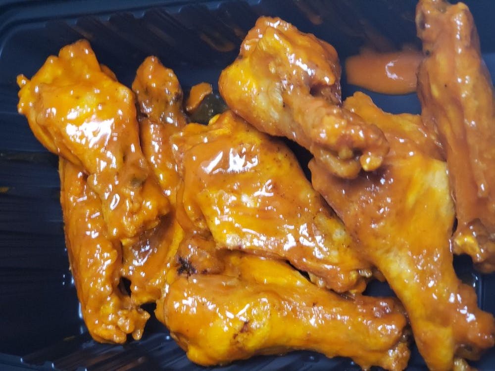 Order Bone In Wings - 8 Pieces food online from House Of Pizza store, San Antonio on bringmethat.com