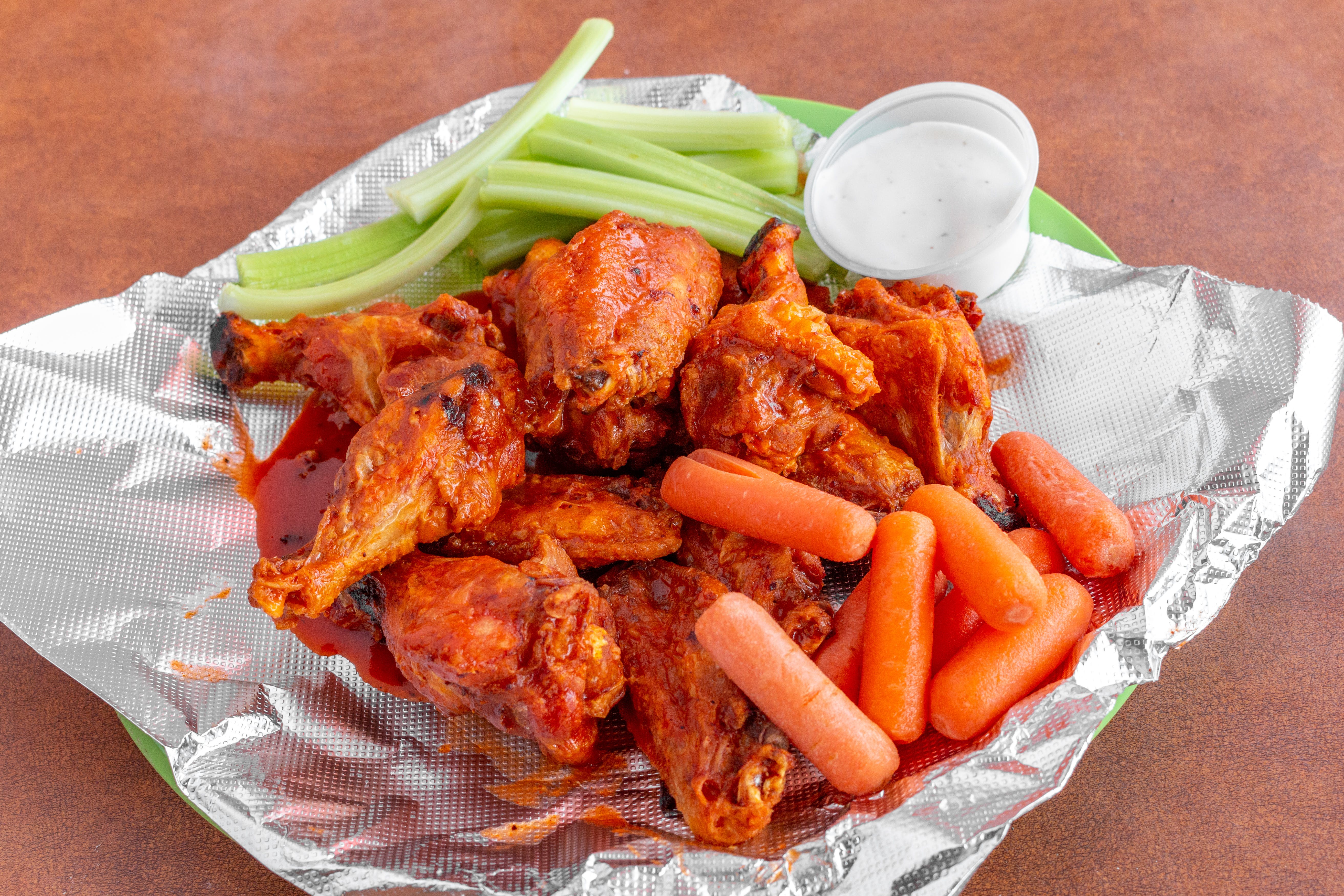 Order Chicken Wings - 1/2 Dozen food online from Famous Pizza store, Denver on bringmethat.com
