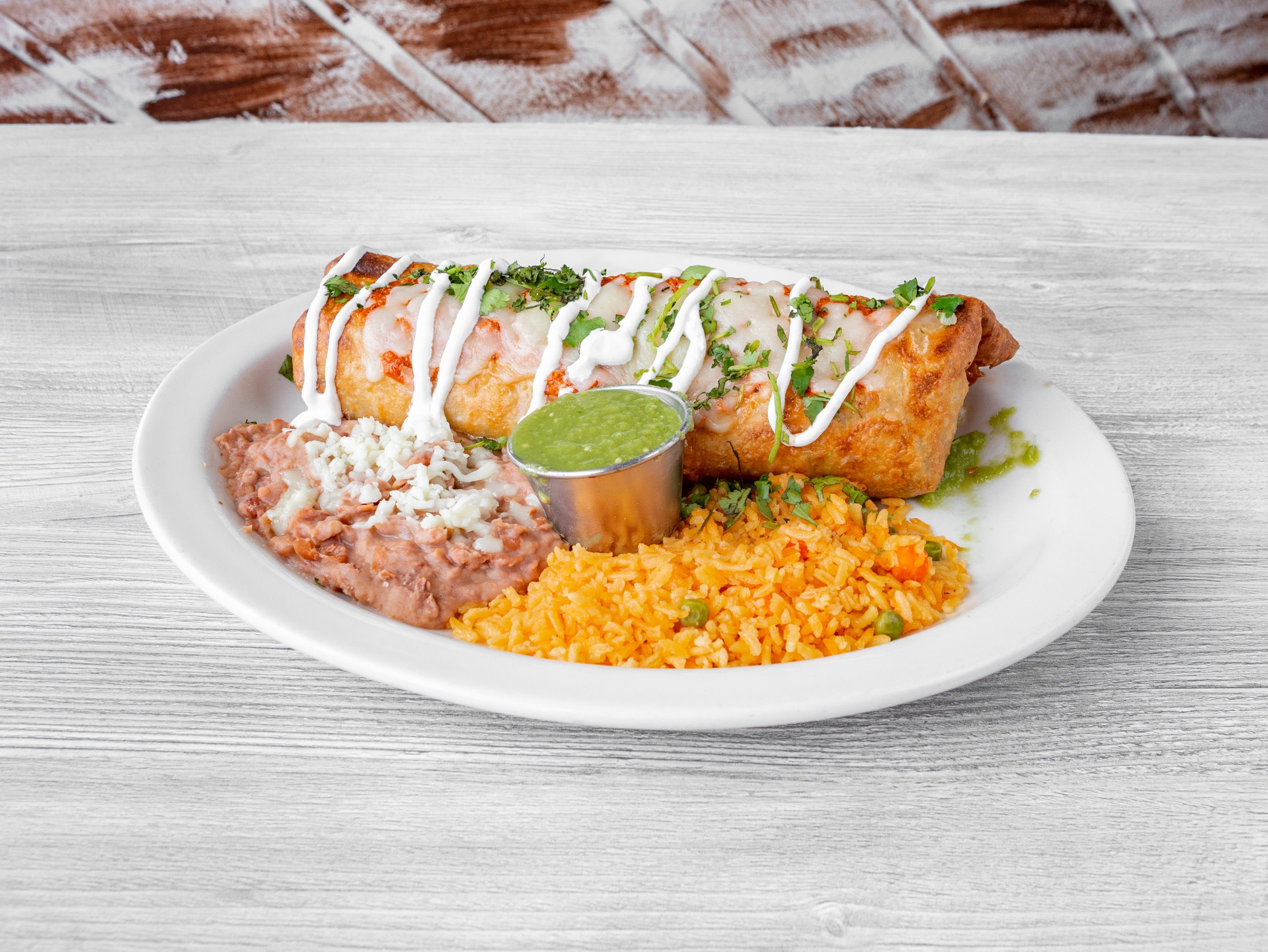 Order Chimi Changa Burrito food online from Wild West Grill store, Waukegan on bringmethat.com