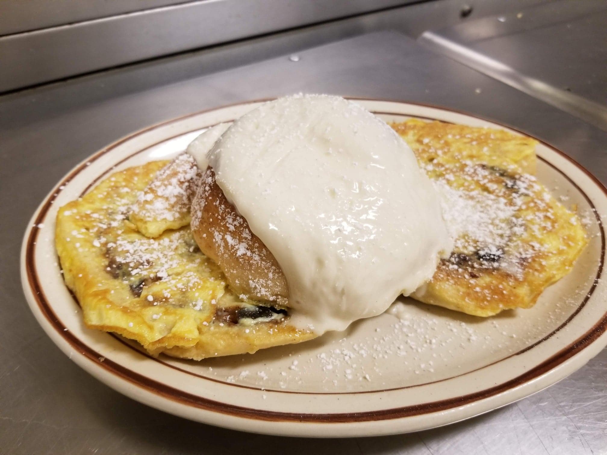 Order Cinnamon Roll French Toast Special food online from Molly Brown's Country Cafe store, Akron on bringmethat.com
