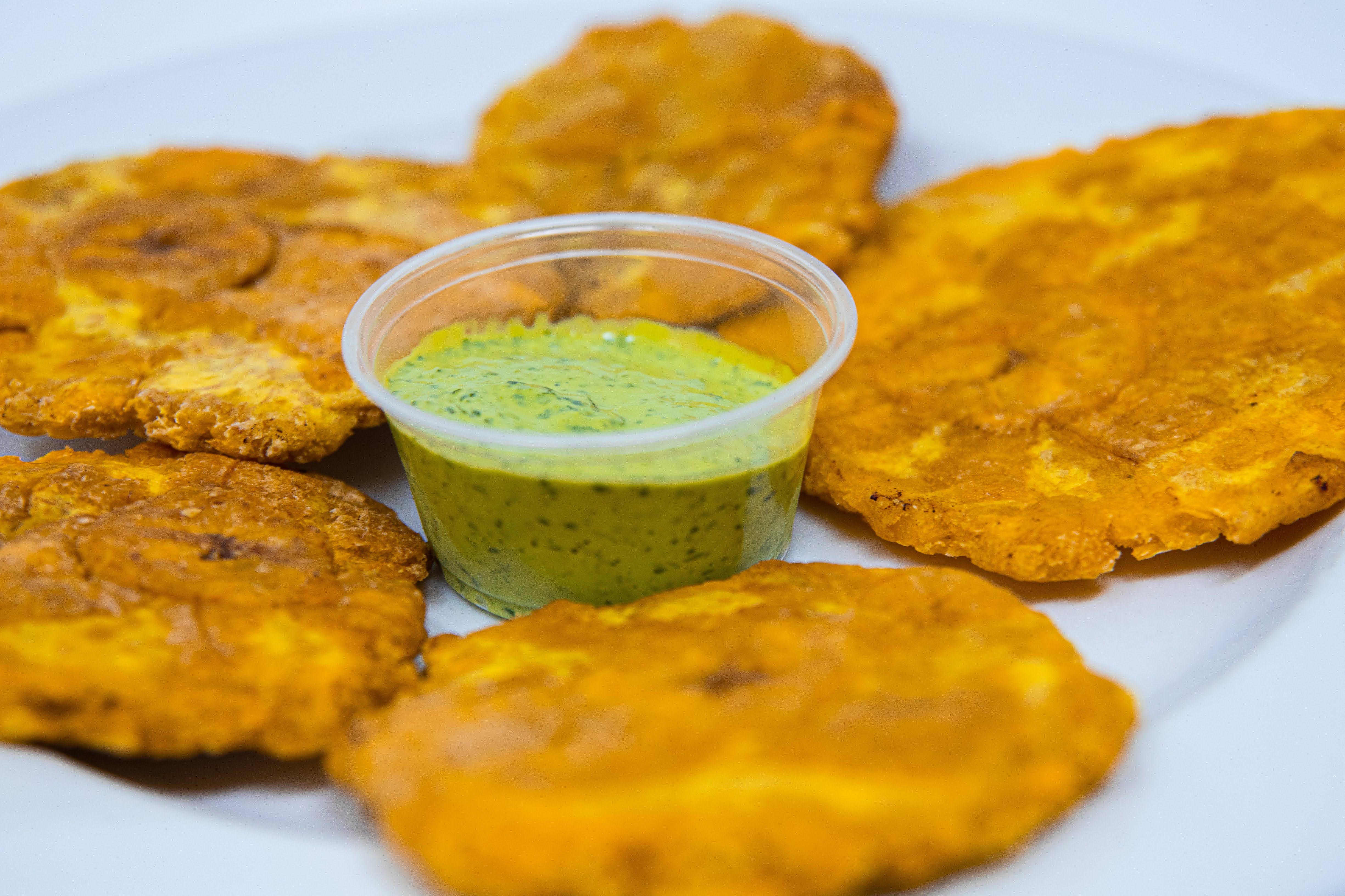 Order Tostones food online from Cafe Con Leche store, Seattle on bringmethat.com
