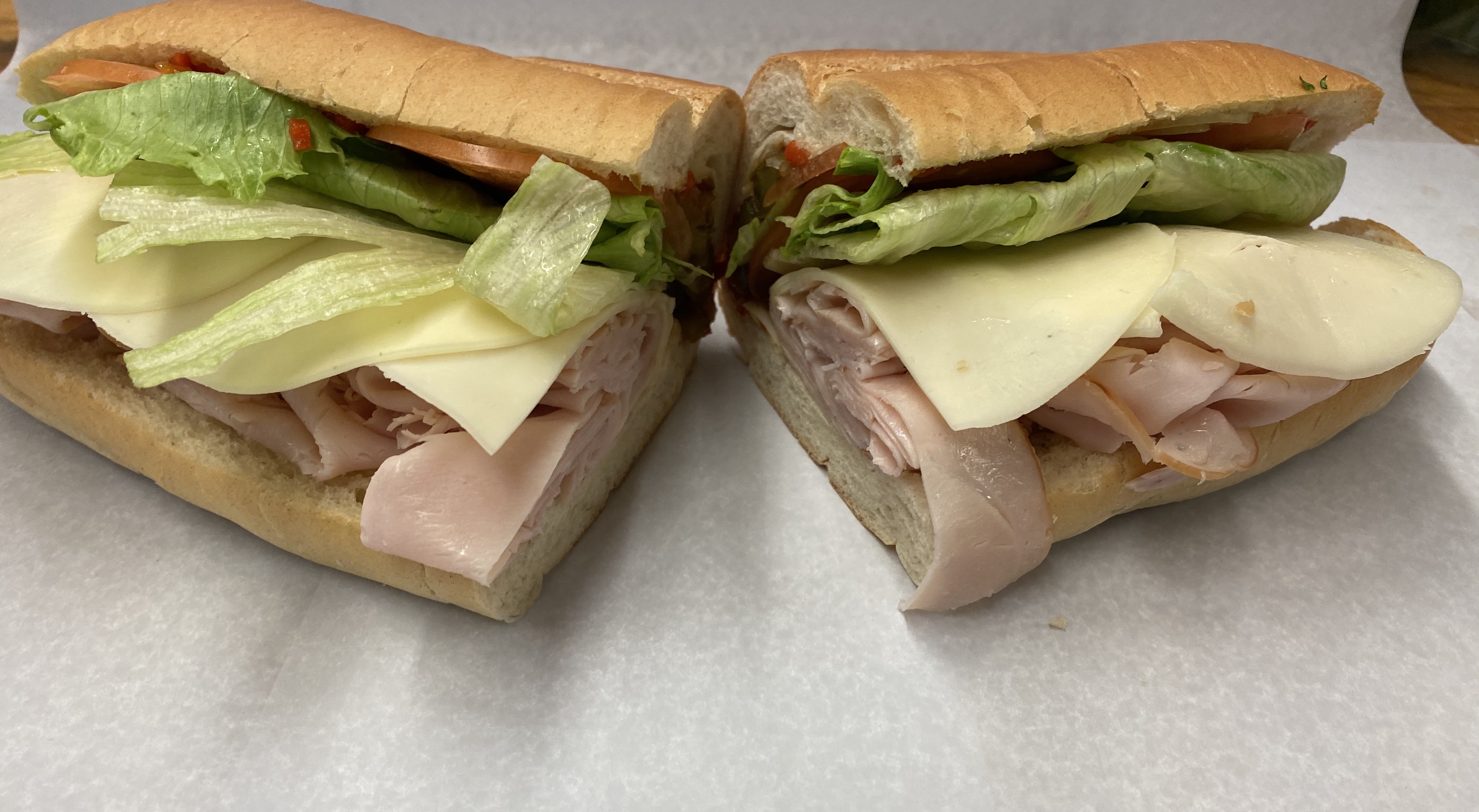 Order Large Turkey & Cheese Sub food online from Mannes Bakery store, Revere on bringmethat.com
