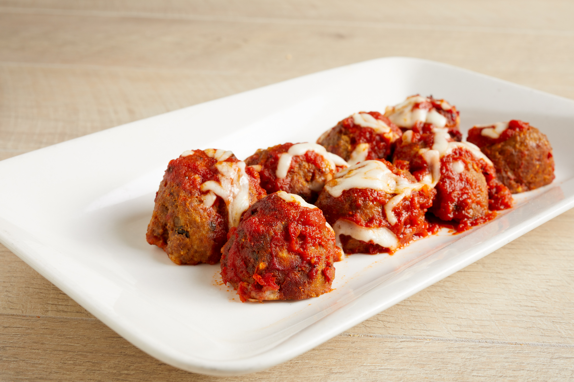 Order Meatball Parmigiana Entree food online from Mario's Pizzeria store, East Northport on bringmethat.com