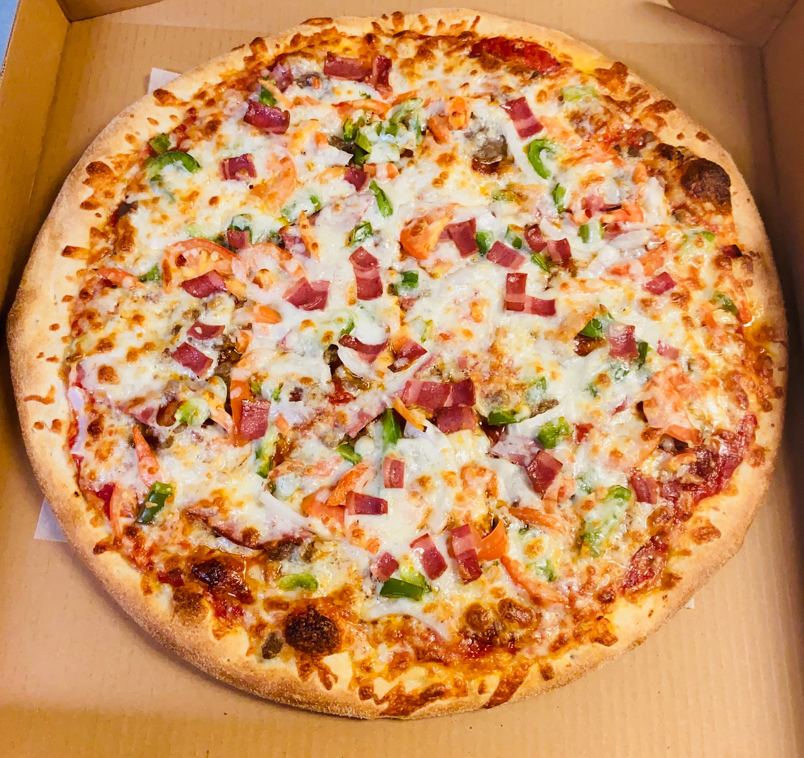 Order Deluxe Pizza - Small 12'' food online from Bejta's Pizza & Subs store, Greensboro on bringmethat.com