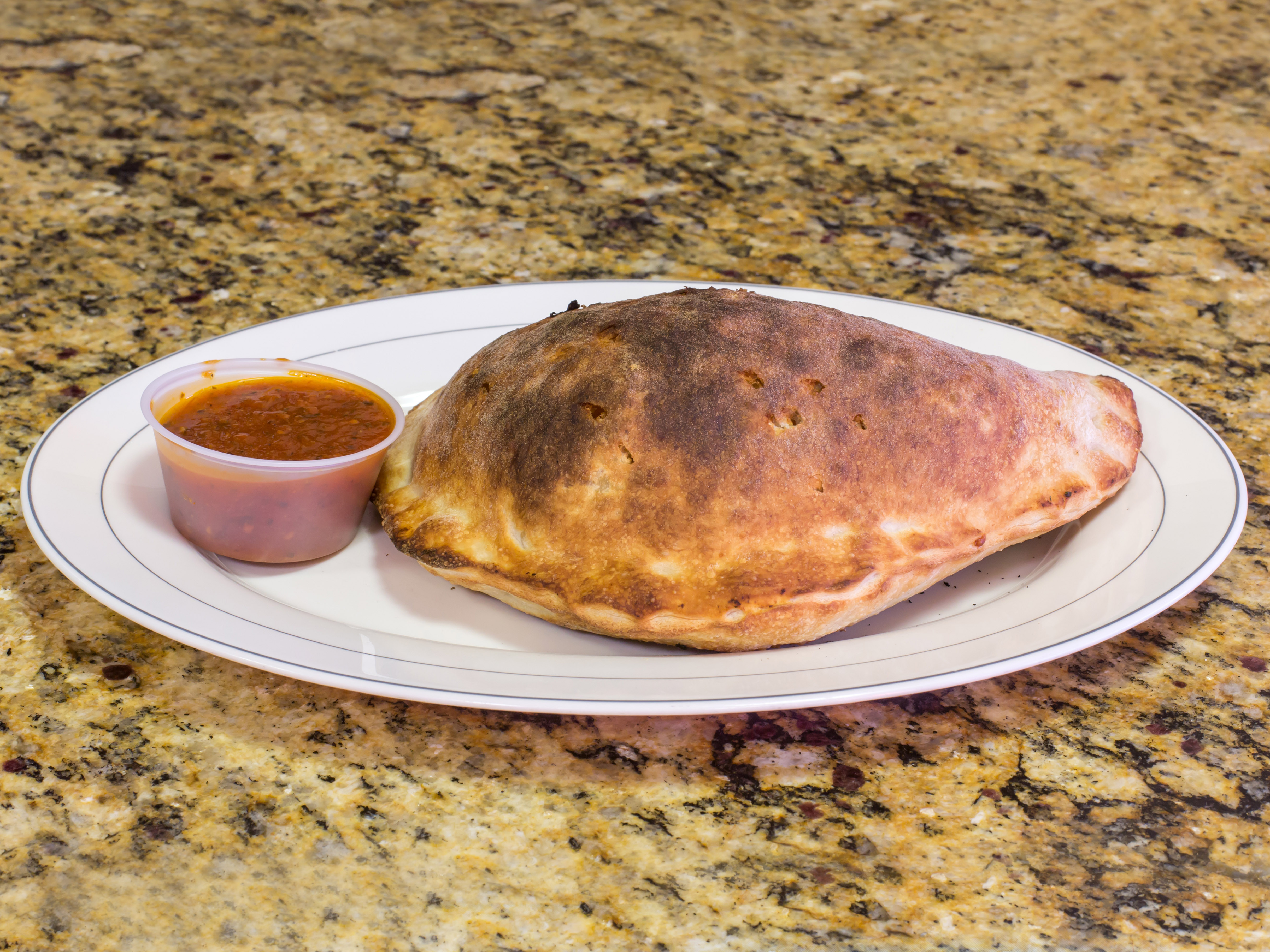 Order Cheese Calzone food online from Little Italy store, Ridgefield Park on bringmethat.com