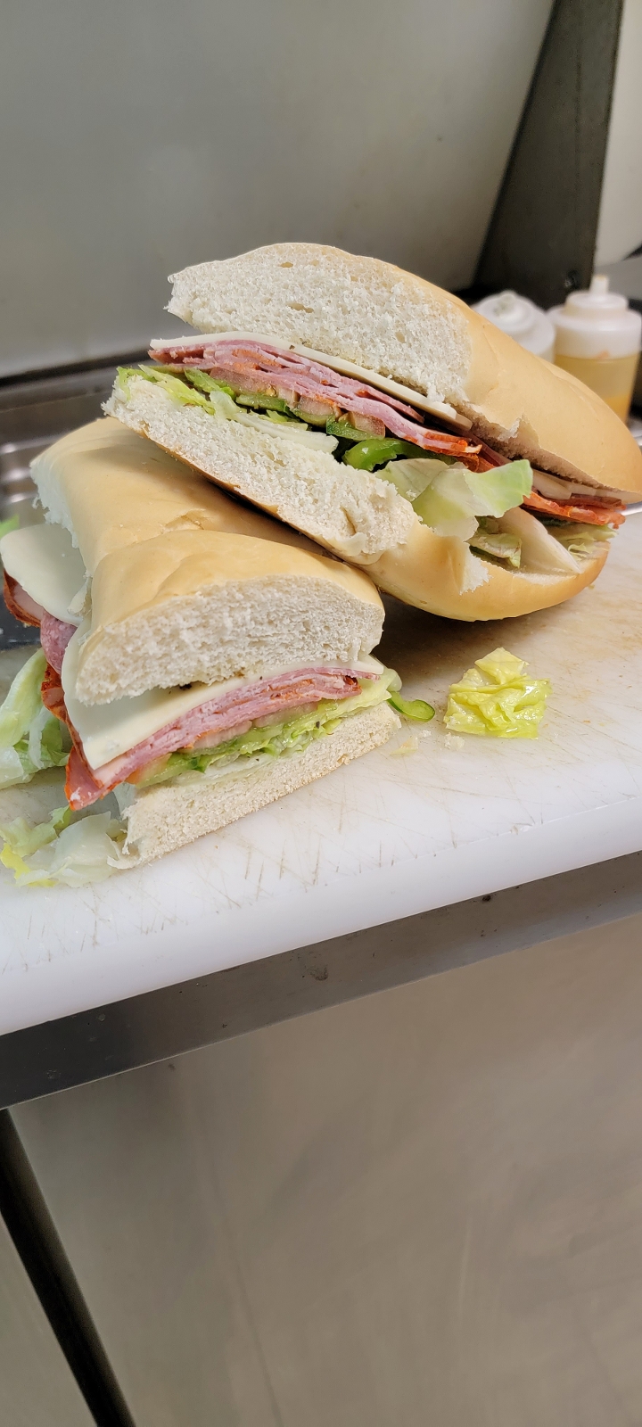 Order Italian Assorted Sub Large food online from Dj Pizzeria store, Spencerport on bringmethat.com