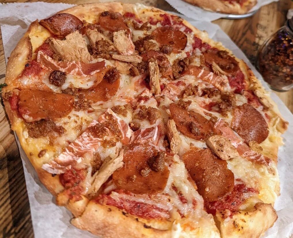 Order Animal Lover's Pizza - 10'' food online from Pythagoras store, Sugar Land on bringmethat.com
