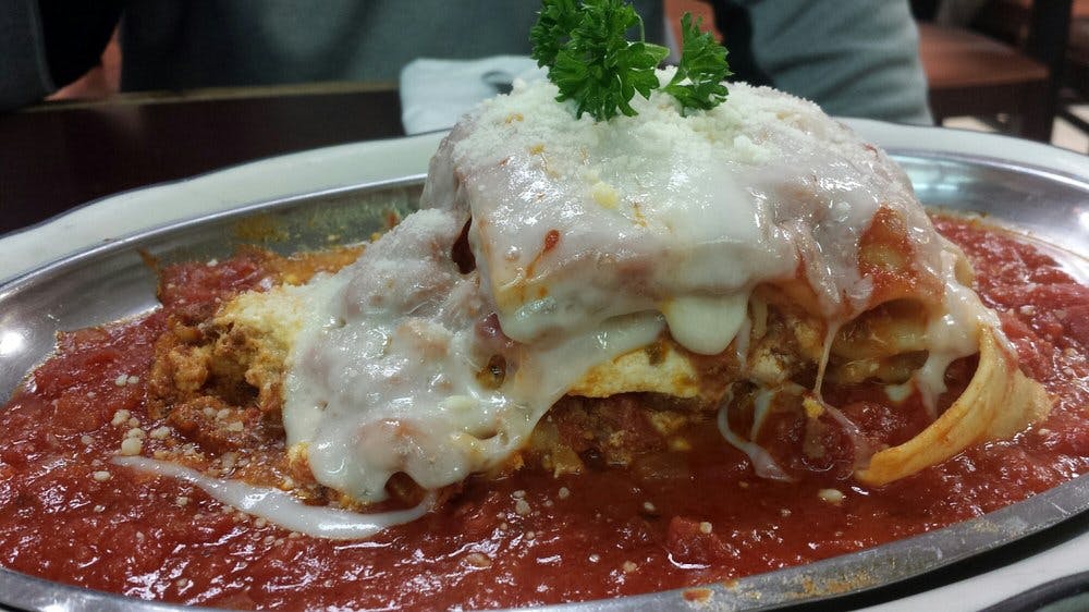 Order Homemade Lasagna - Entree food online from Apollos Pizza store, Richmond on bringmethat.com