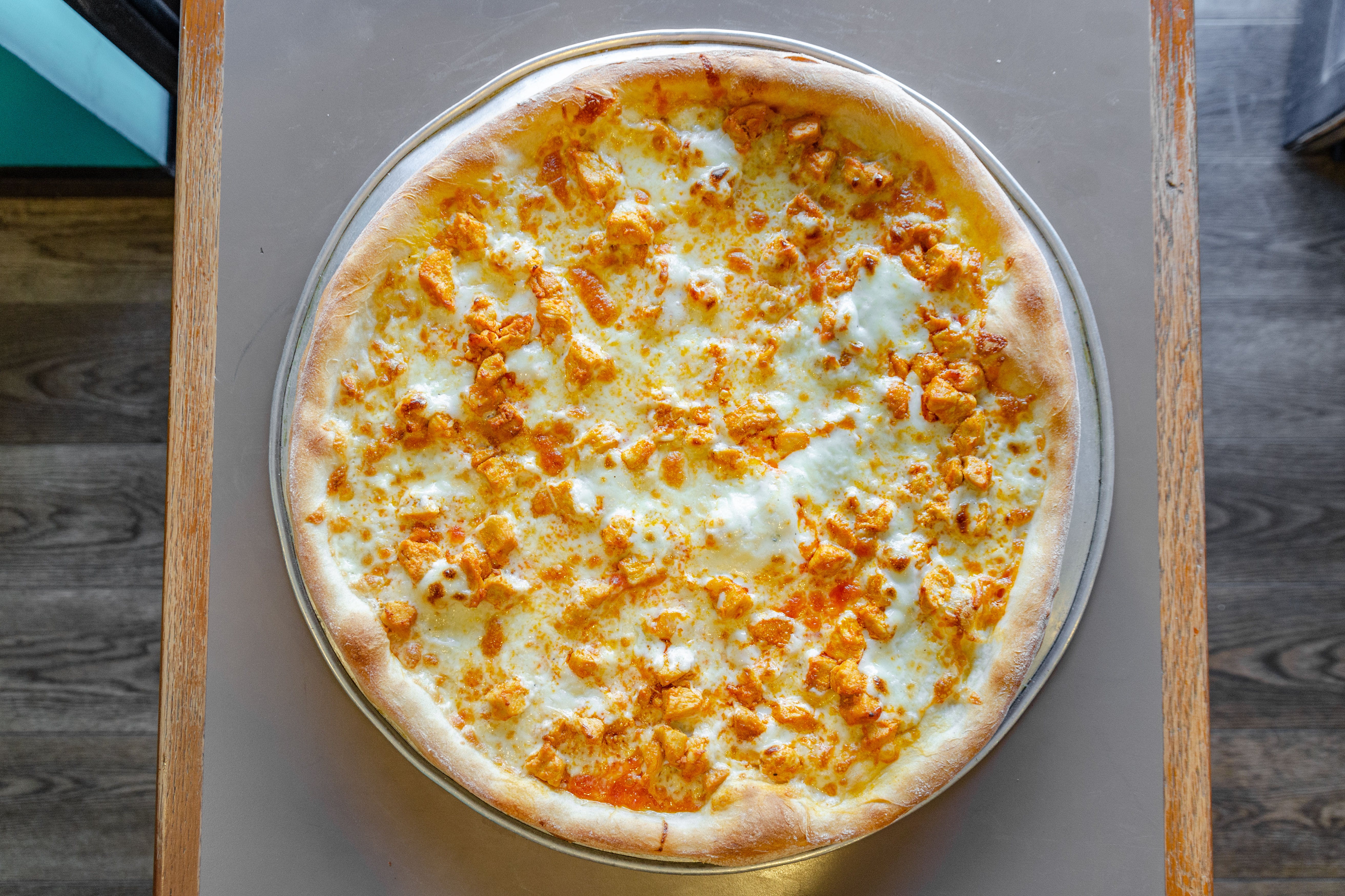 Order Buffalo Chicken Pizza - Small 14'' (6 Slices) food online from Piazza pizza store, Astoria on bringmethat.com