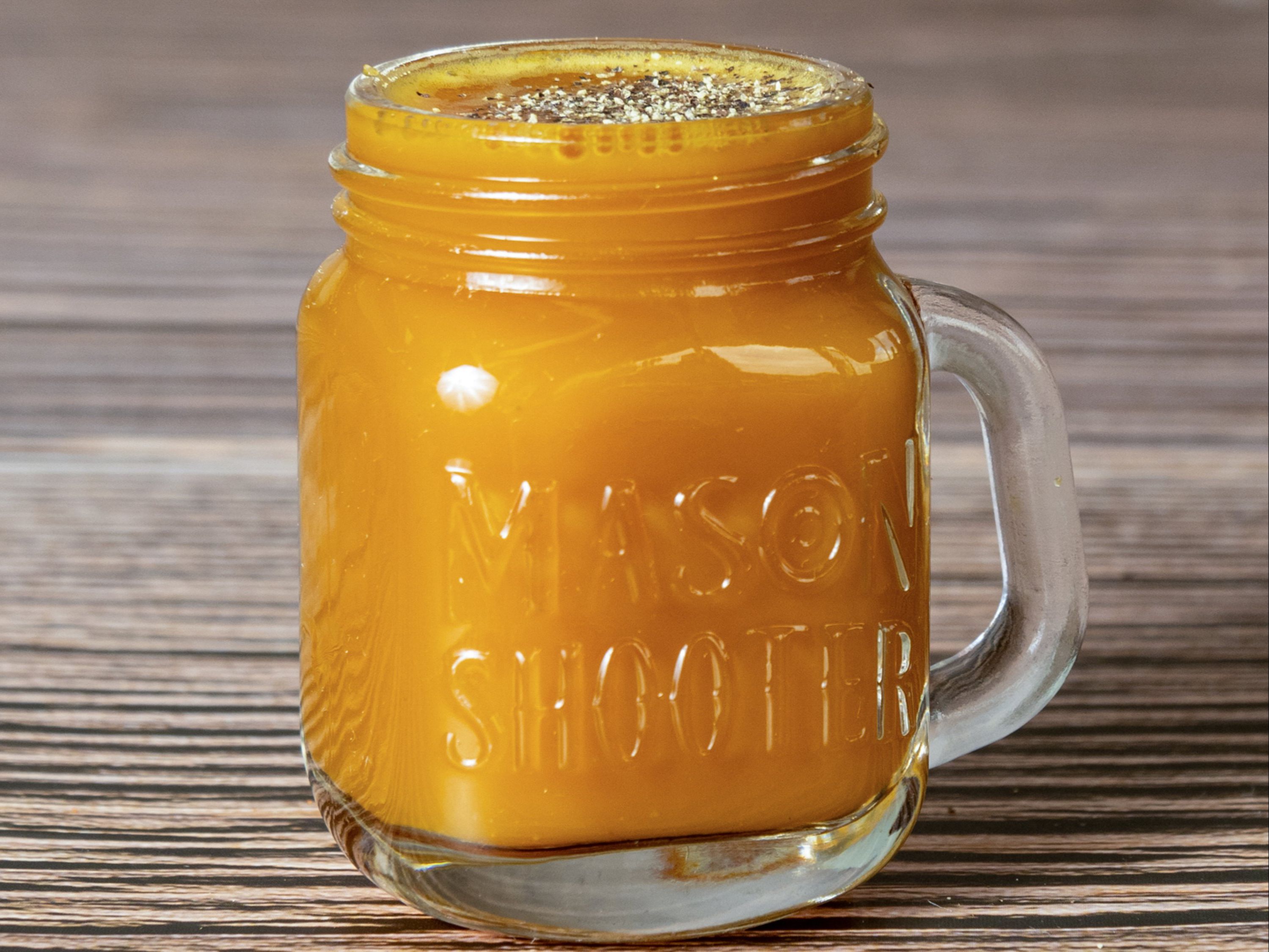 Order Turmeric Shot 1oz food online from Iget Juiced store, Snellville on bringmethat.com