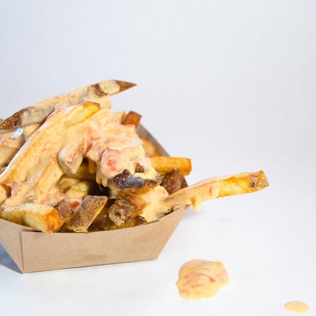 Order Queso Fries food online from Boss Chicken store, El Paso on bringmethat.com
