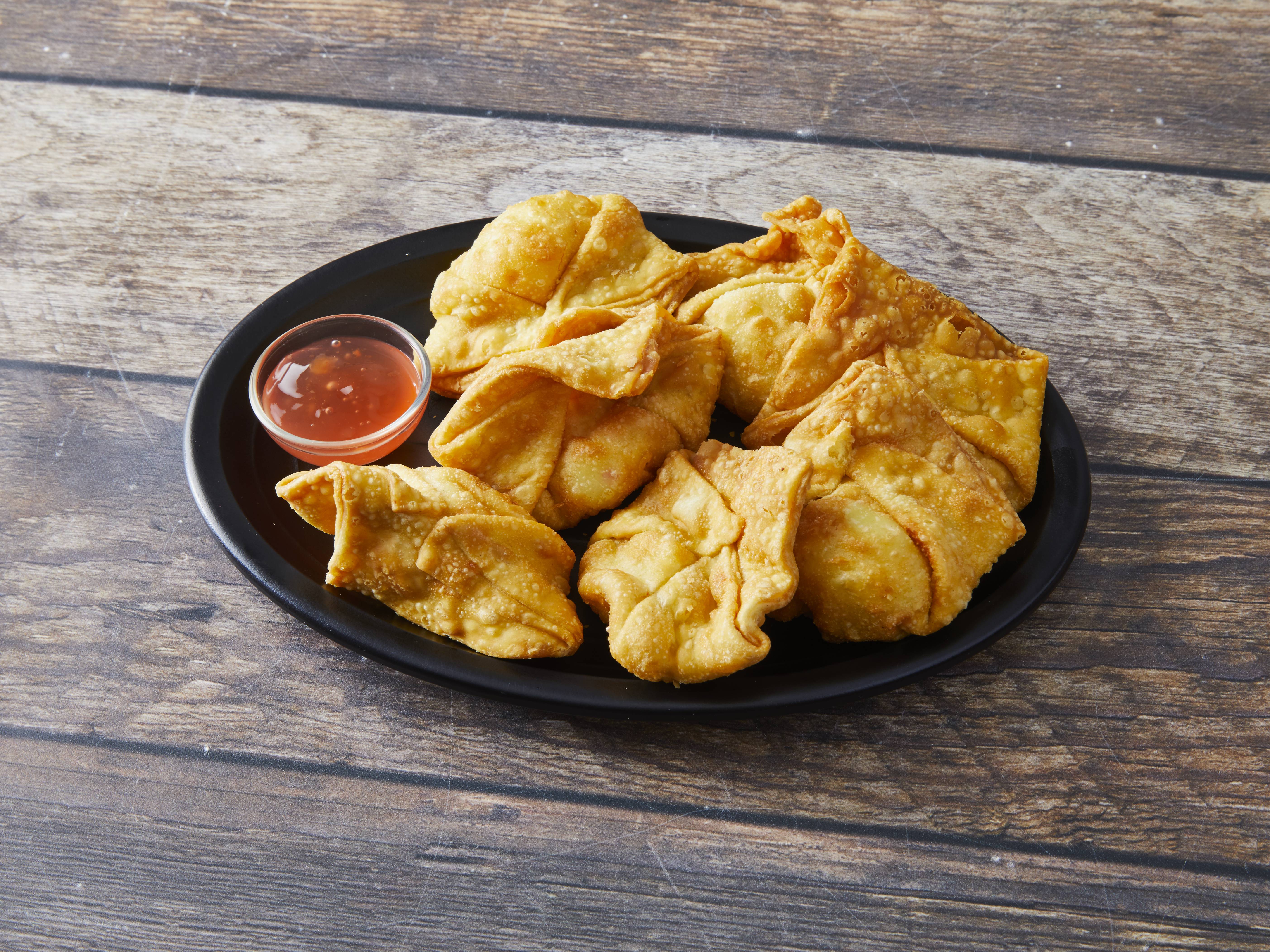 Order Crab Cheese Rangoon food online from Peking Chinese Food store, Chicago on bringmethat.com
