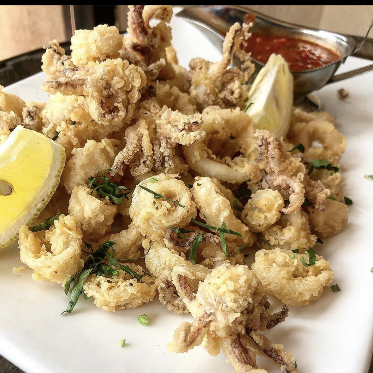Order Calamari Fritti food online from Panini Grill store, Freehold on bringmethat.com
