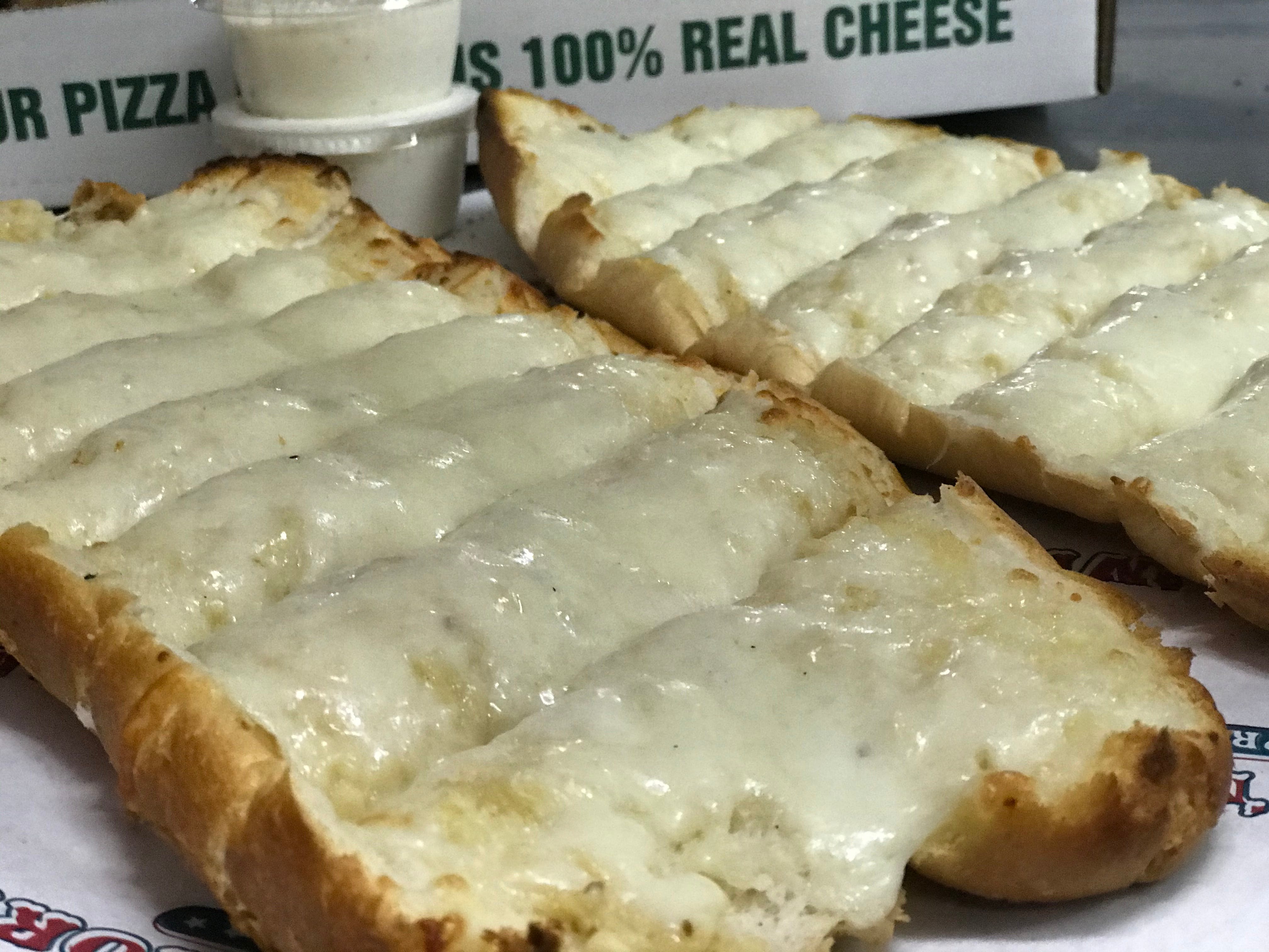 Order Garlic Bread - Appetizer food online from Little Italy Pizza and Pasta store, Abilene on bringmethat.com