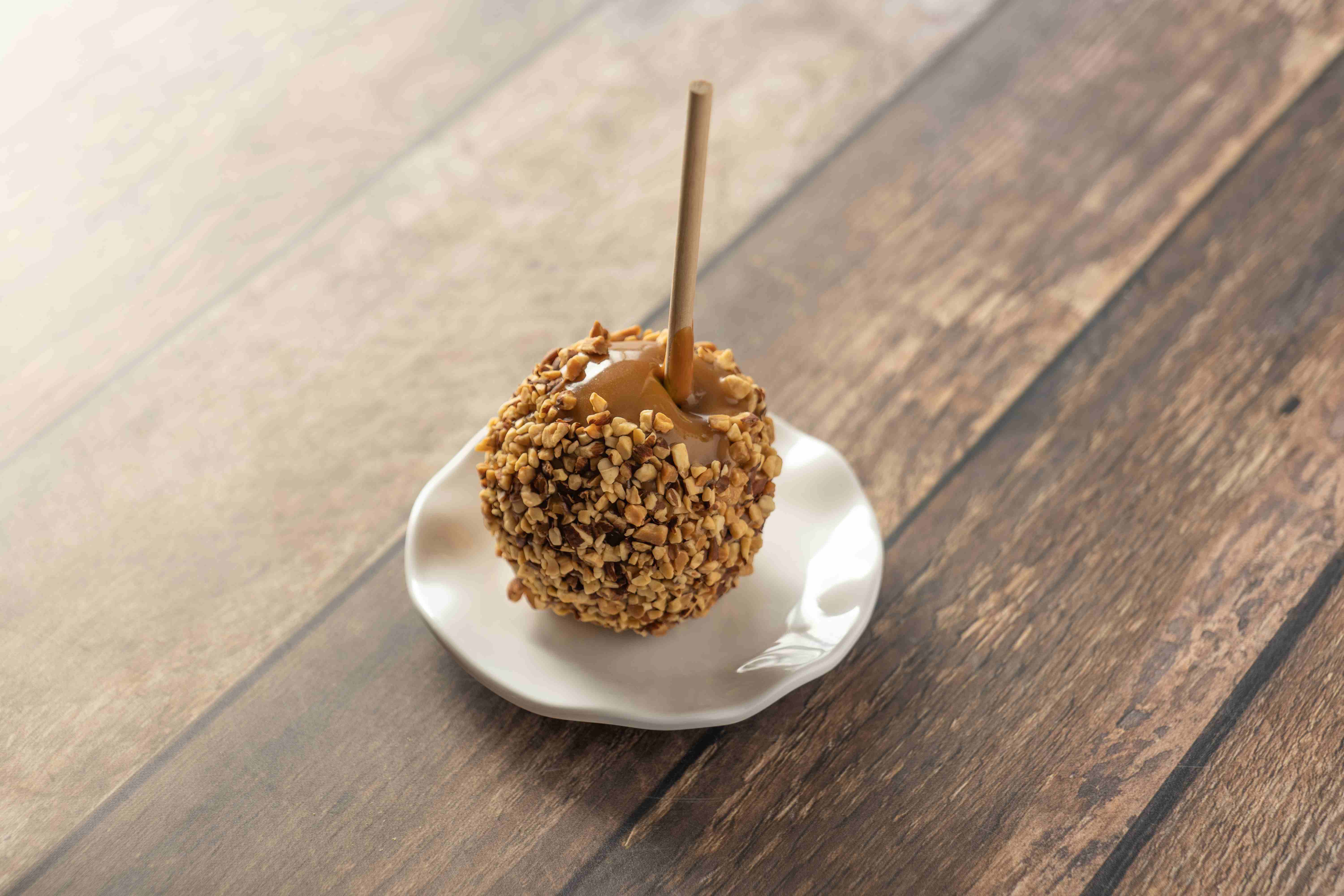 Order Almond Caramel Apple food online from Rocky Mountain Chocolate Factory store, Redondo Beach on bringmethat.com