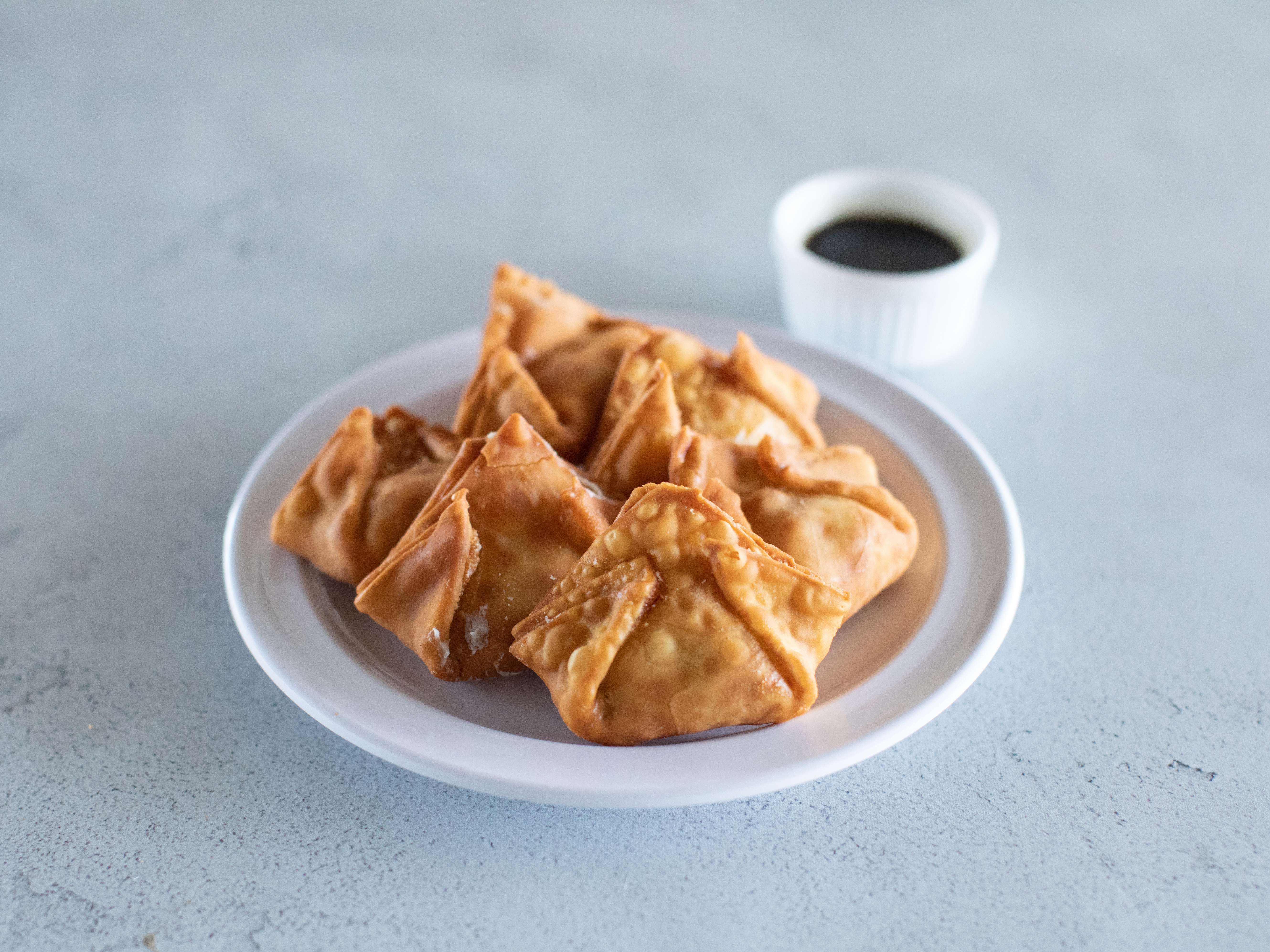 Order A9. 6 Pieces Crab Rangoon food online from Yen Ching store, Henrico on bringmethat.com