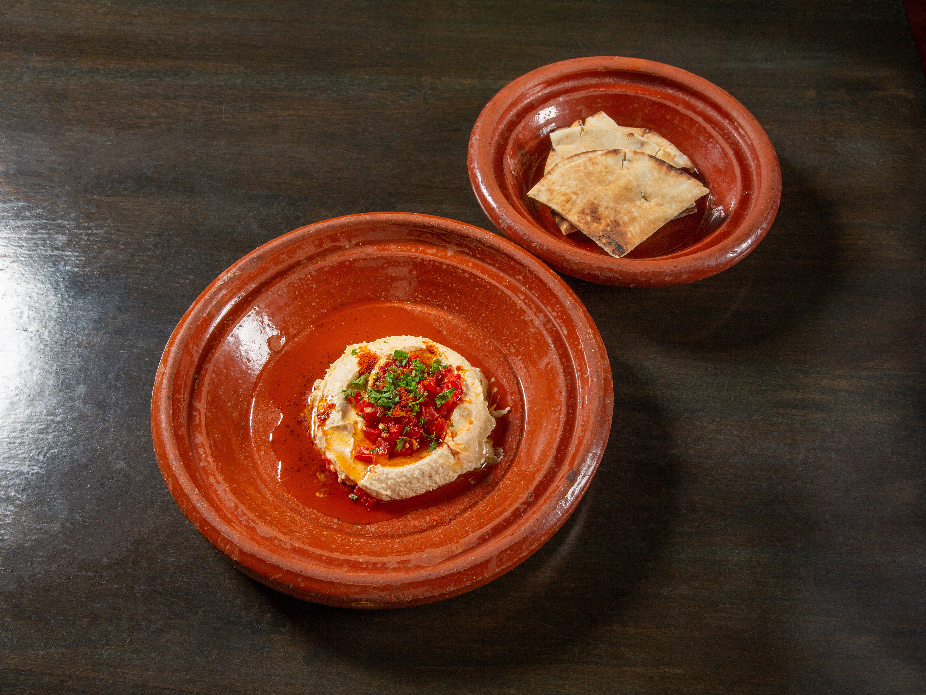 Order Hummus and Grilled Tomatoes food online from The Village Mediterranean Restaurant store, San Clemente on bringmethat.com