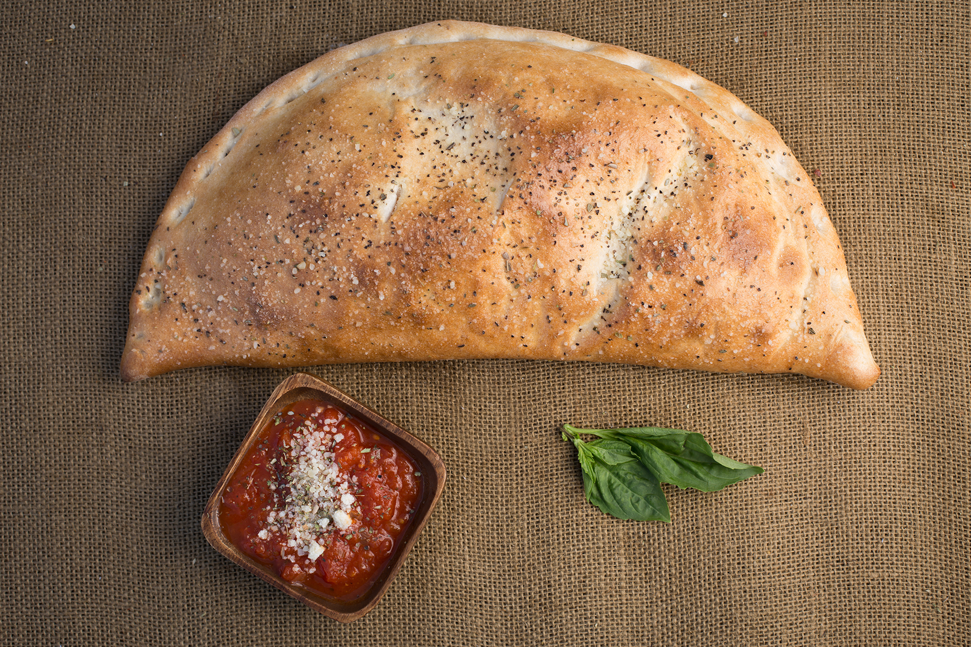 Order Mozzarella and Ricotta Calzone   food online from Jeb Pizza store, Troy on bringmethat.com