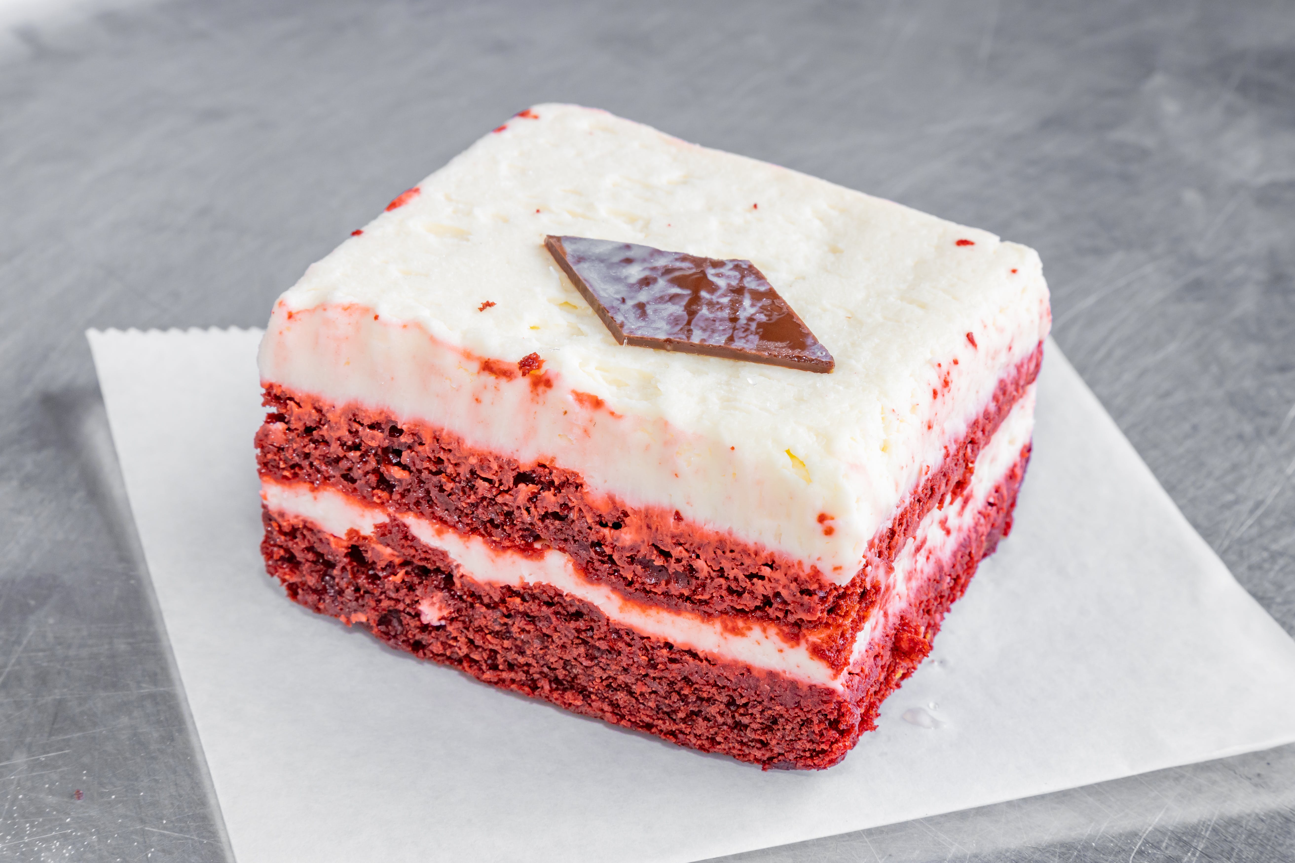 Order Red Velvet Cake - Dessert food online from Emilio's Pizza store, Burbank on bringmethat.com