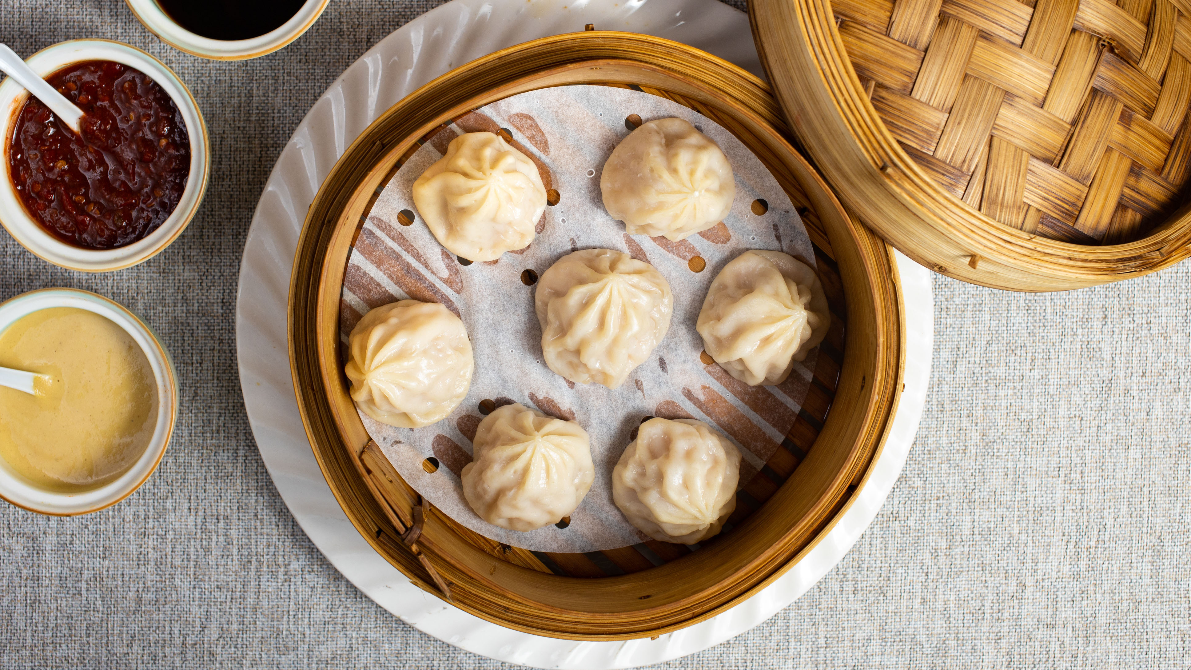 Order Shang Hai Style Pork Dumpling。小龍包 food online from Fortune Cookie Chinese store, San Francisco on bringmethat.com