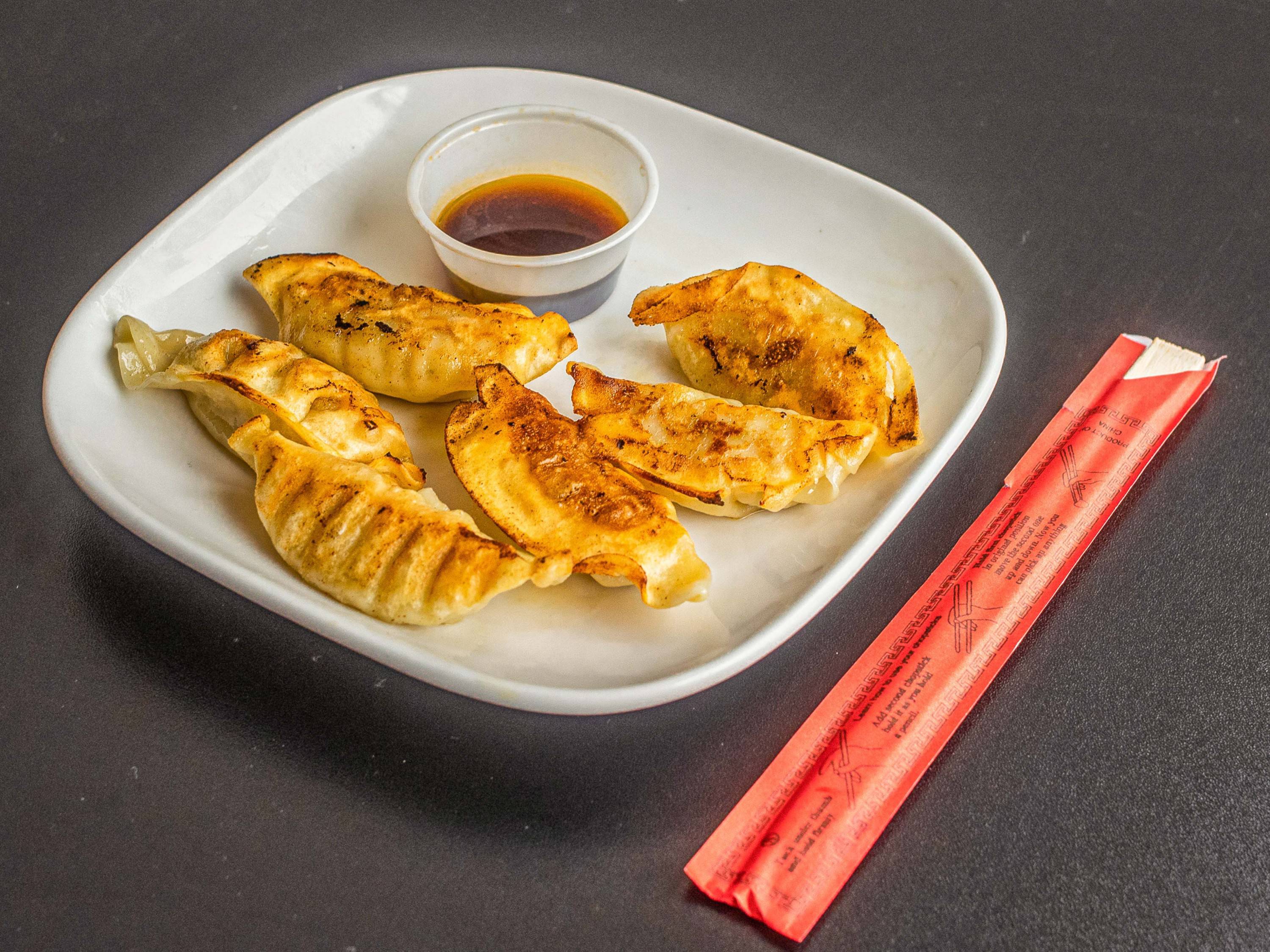 Order 4. Pan Fried Pot Stickers food online from Chang's Wok Inn store, Peoria on bringmethat.com