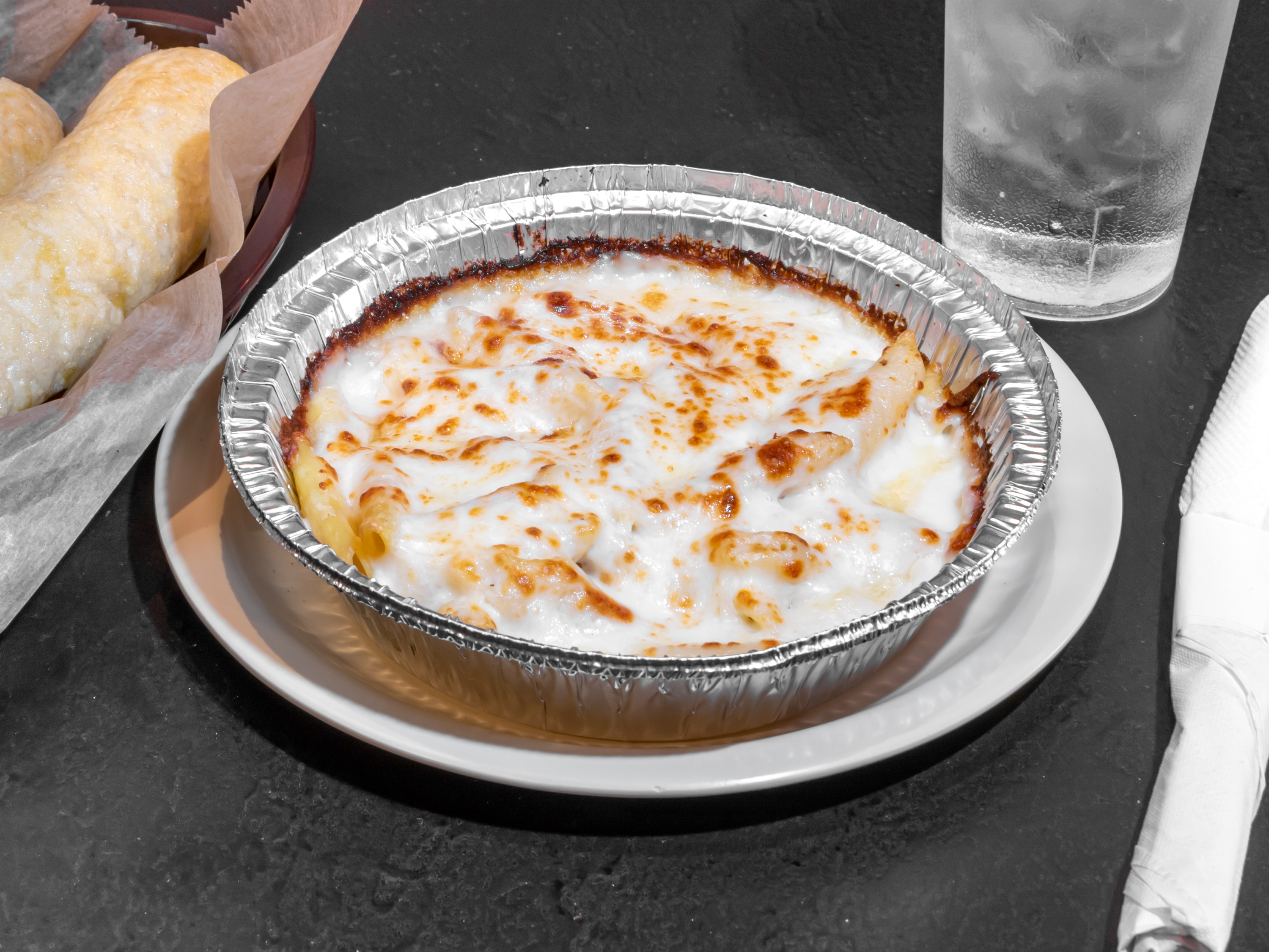 Order Baked Rigatoni Alfredo food online from Mancinos Pizza & Grinders store, Fond Du Lac on bringmethat.com