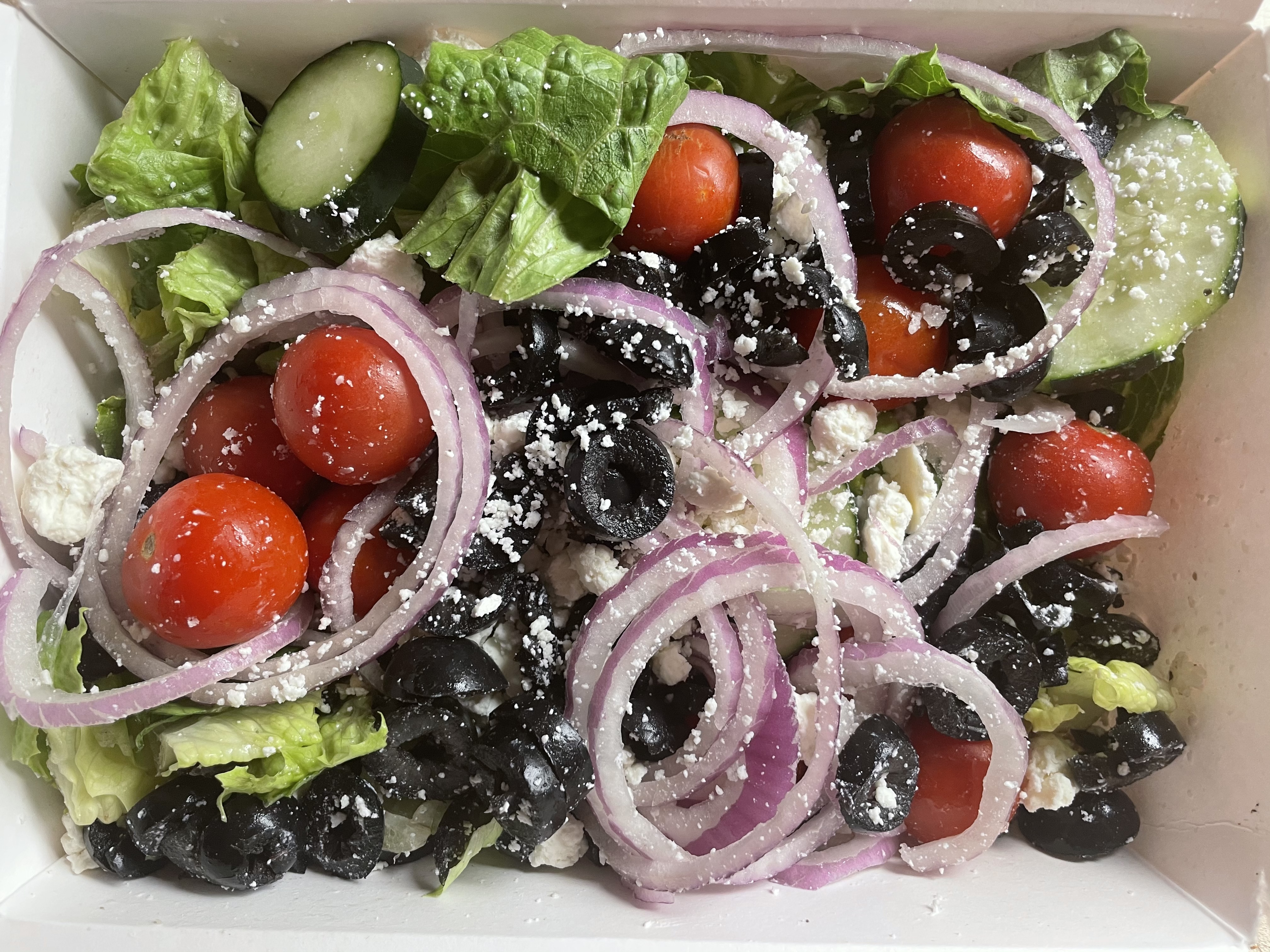 Order Greek Salad food online from La Vals Pizza store, Alameda on bringmethat.com