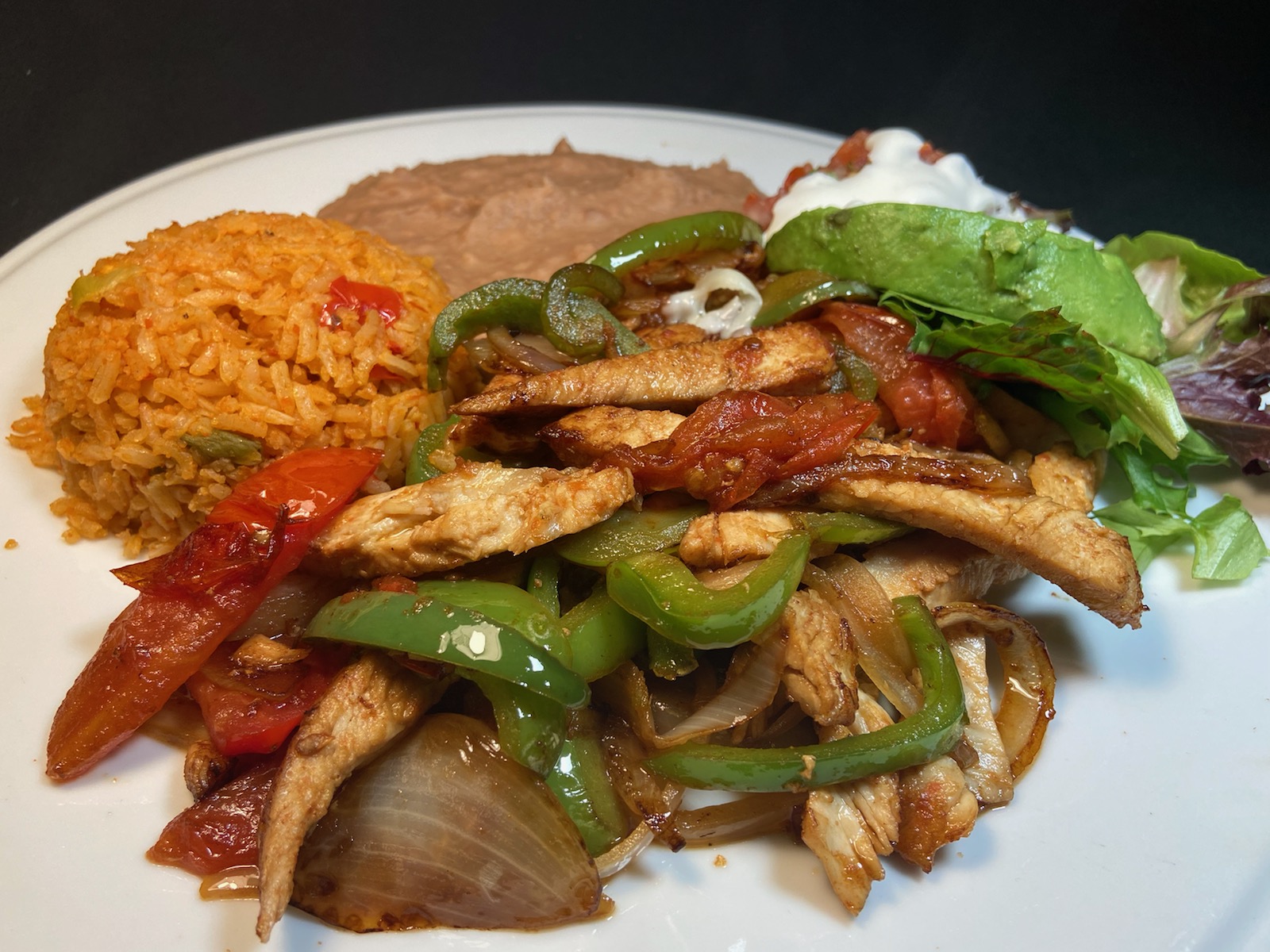 Order Fajitas Plate food online from Adelita Taqueria Restaurant & Bar store, San Jose on bringmethat.com