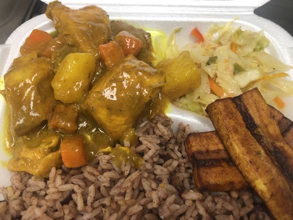 Order Curry Chicken food online from Yaso Jamaican Grill store, Indianapolis on bringmethat.com