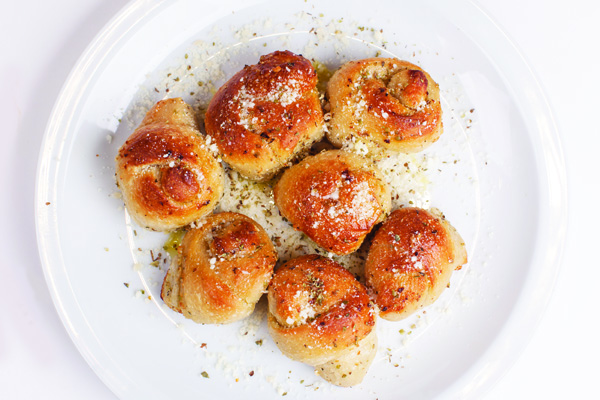 Order Garlic Knots - 12 Pieces food online from Umberto Pizzeria store, Bellmore on bringmethat.com