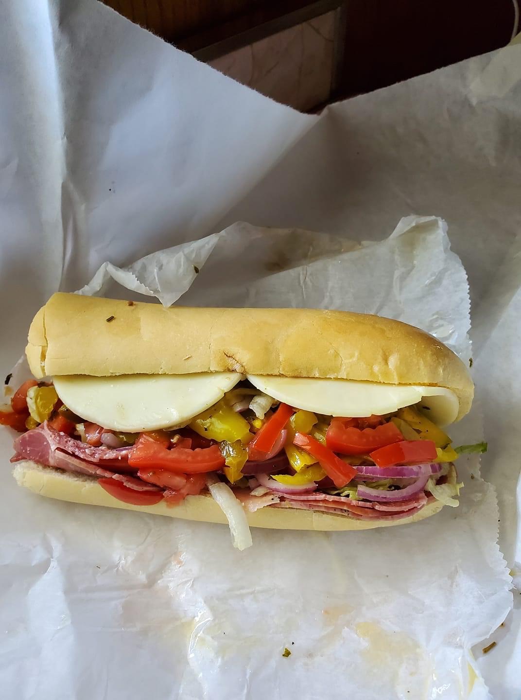 Order 8" Italian Sub food online from World Importing Market store, Uniontown on bringmethat.com