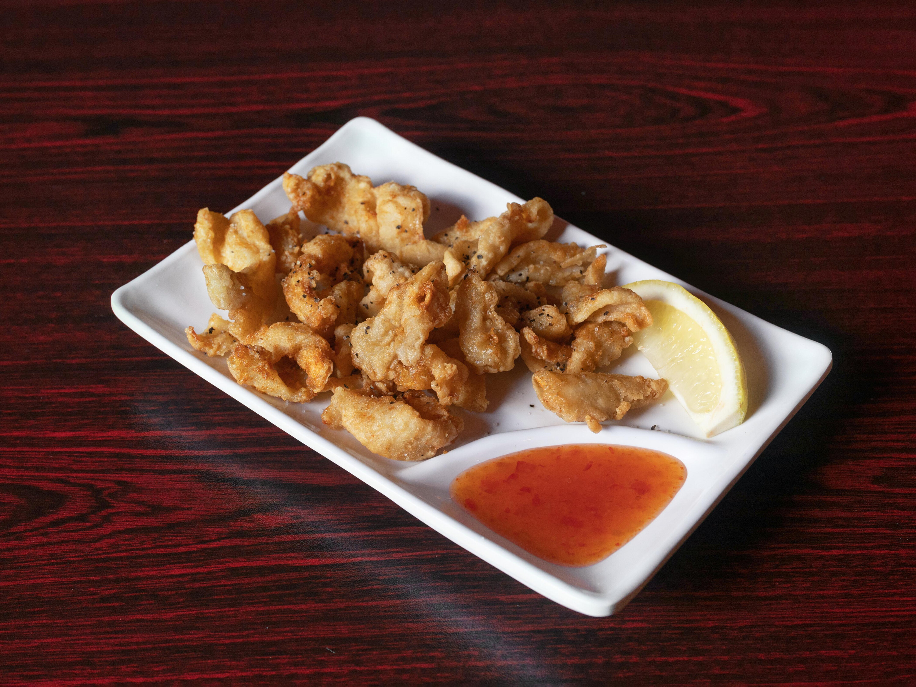 Order A9. Fried Calamari food online from Asahi Japanese Grill store, Lenoir City on bringmethat.com
