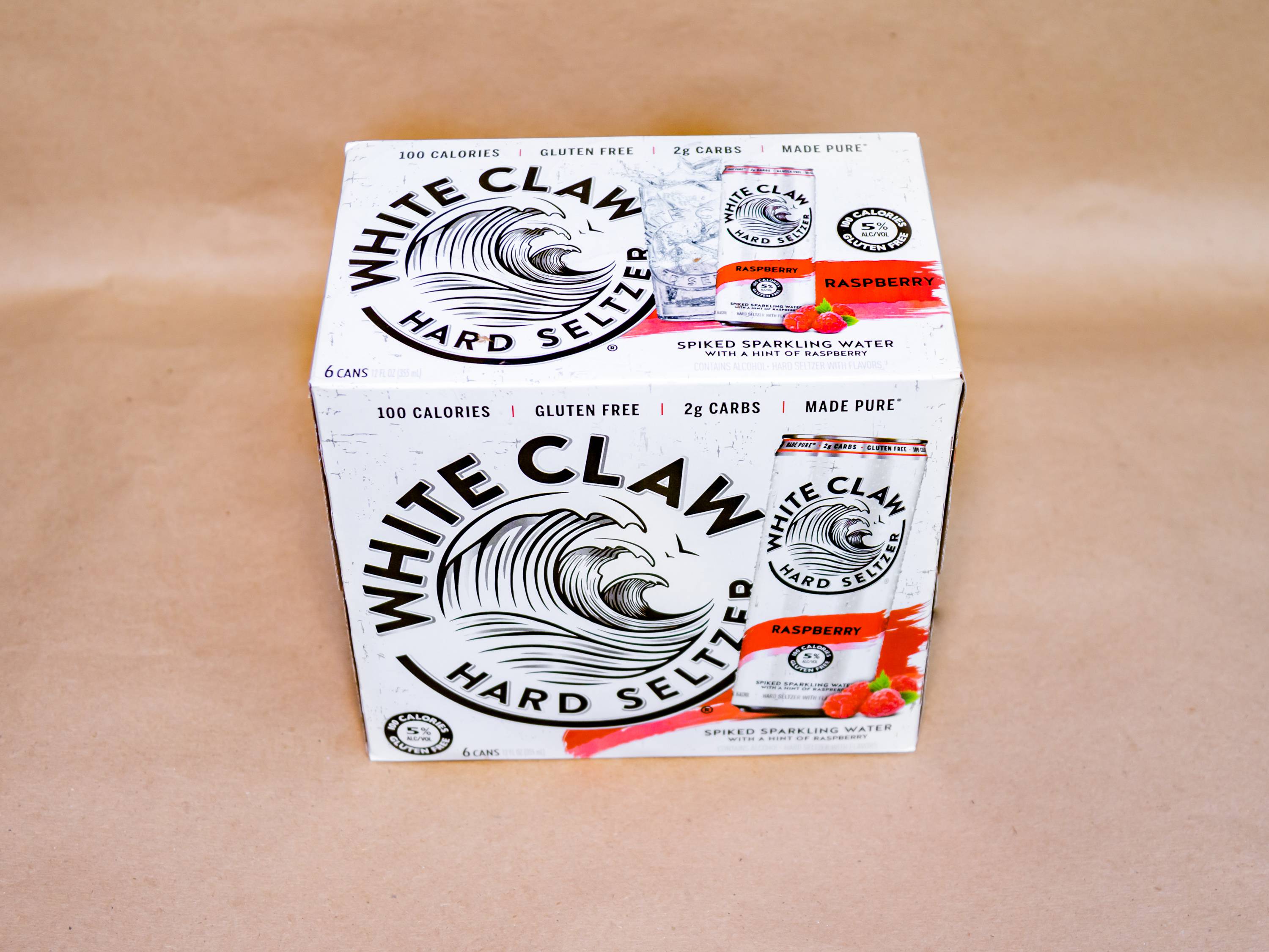 Order 6 Pack Canned Raspberry White Claw food online from Blue Moon Beer And Smoke Shop store, Holbrook on bringmethat.com