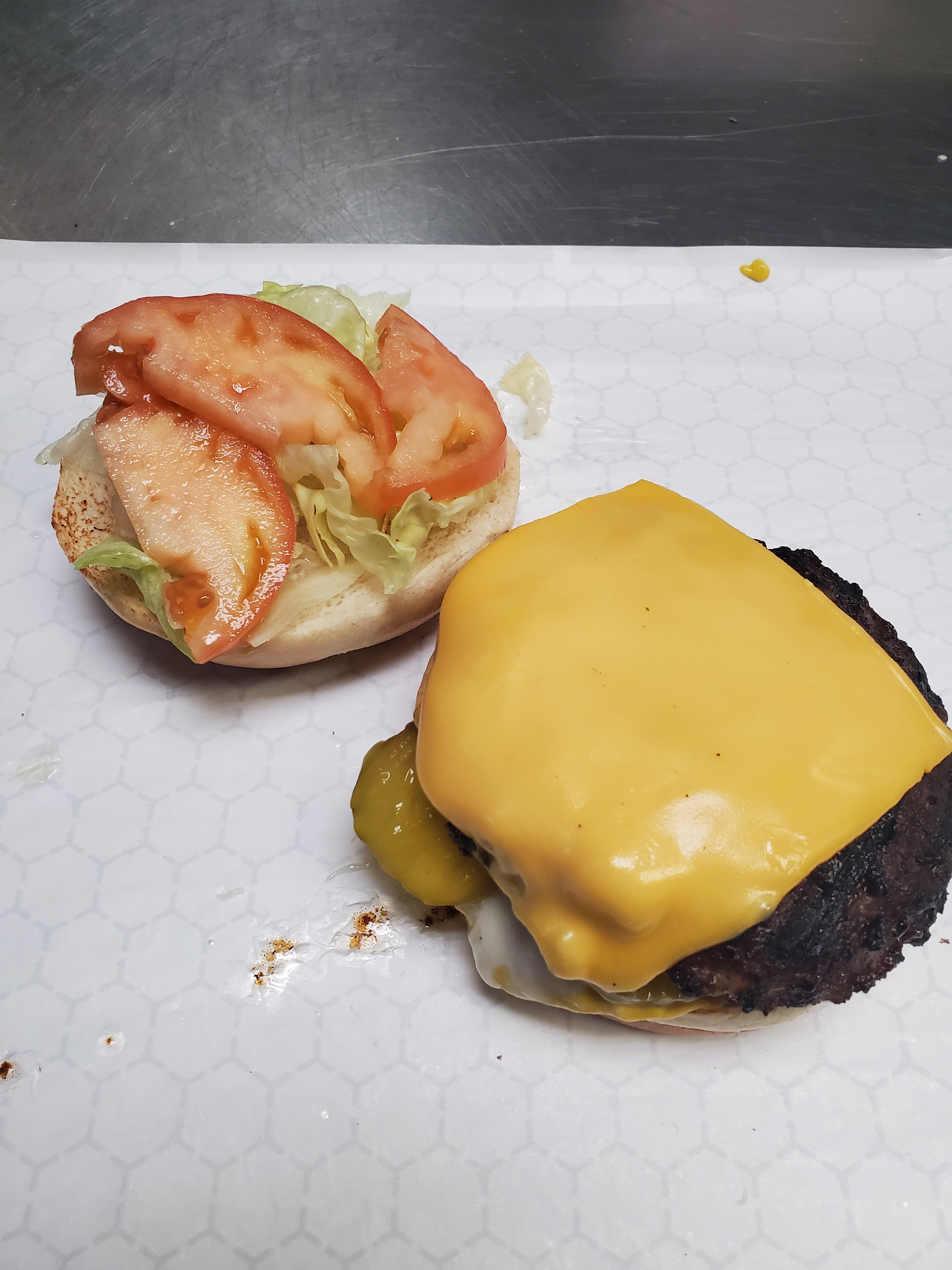 Order Cheeseburger - 1/2 lb. food online from Pizza Cucina store, Oswego on bringmethat.com