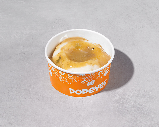 Order Regular Mashed Potatoes with Cajun Gravy food online from Popeyes store, Akron on bringmethat.com