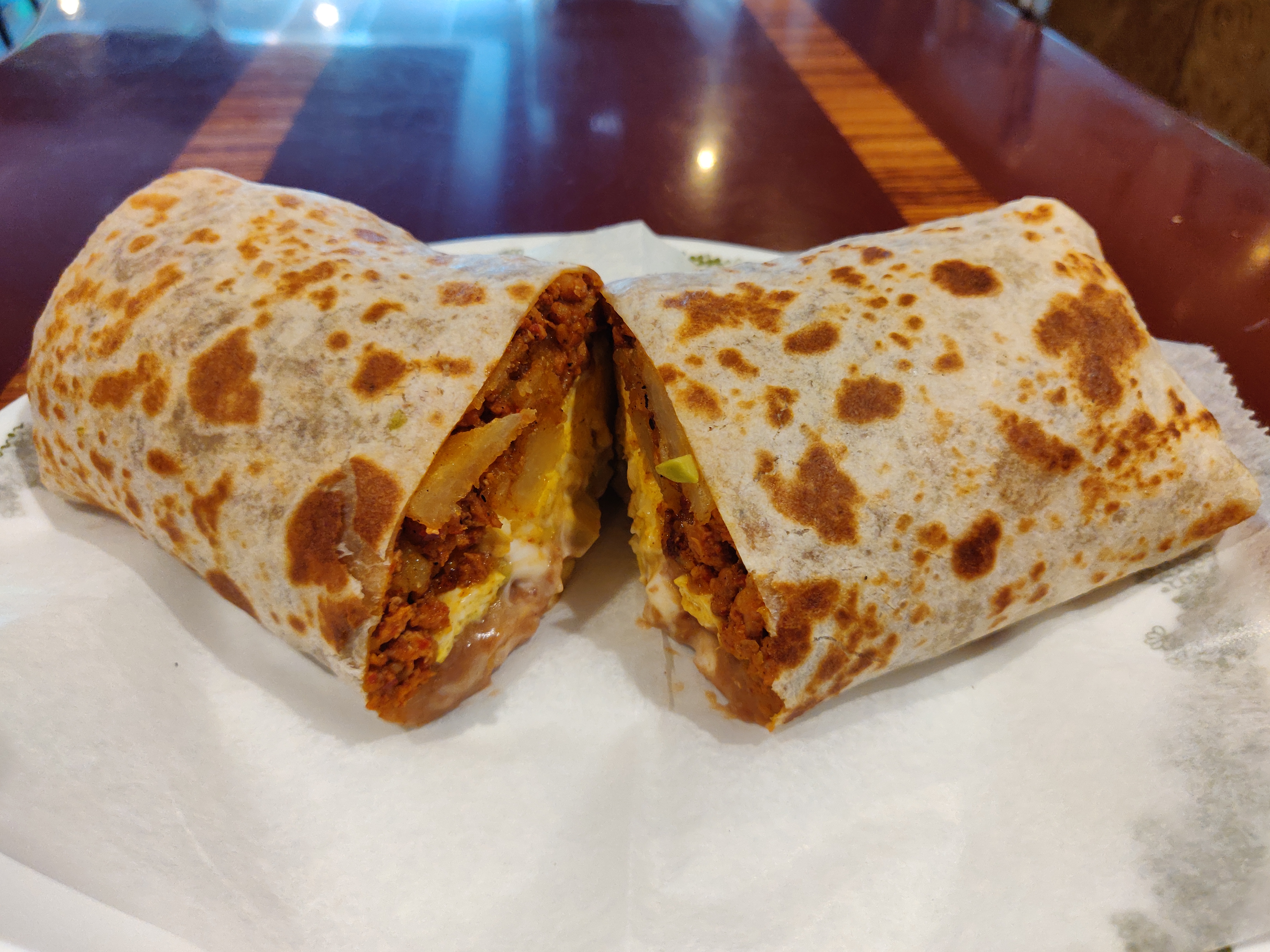 Order Chorizo Breakfast Burrito food online from Taqueria El Ranchito store, Chicago on bringmethat.com
