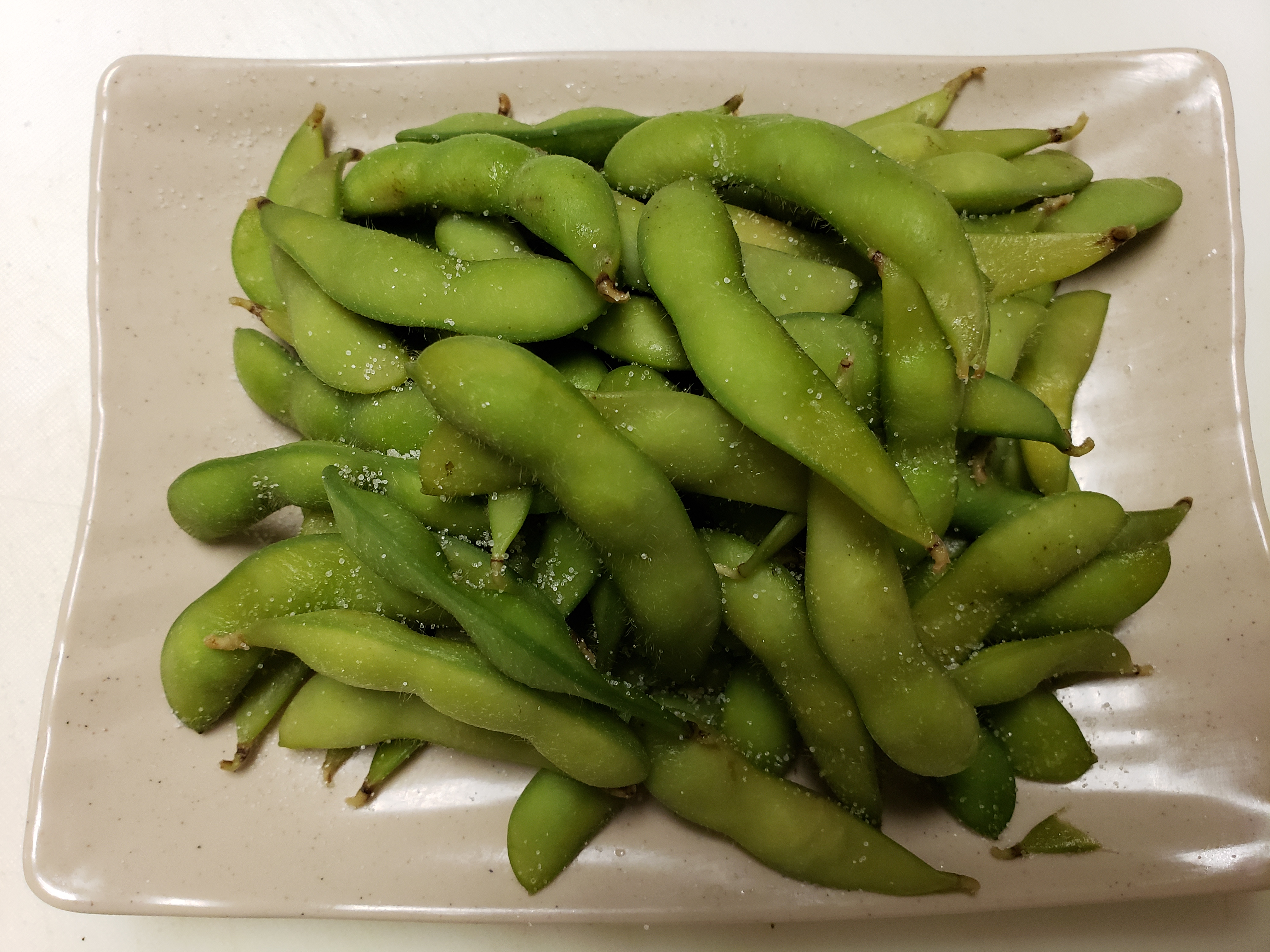 Order Edamame food online from The Pho store, Austin on bringmethat.com