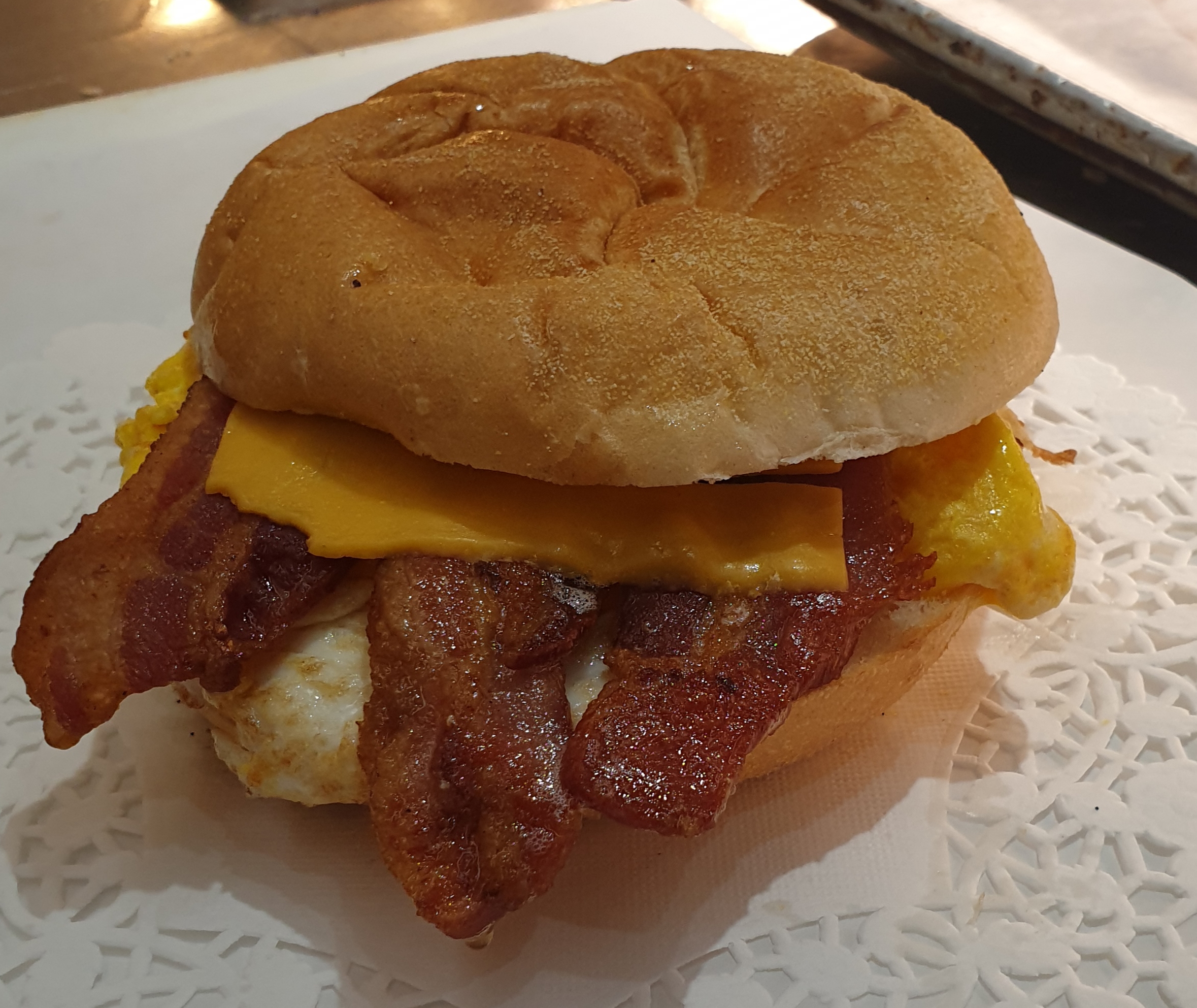 Order 2B-2 Eggs, Bacon and Cheese on Roll food online from Taz Cafe store, New York on bringmethat.com