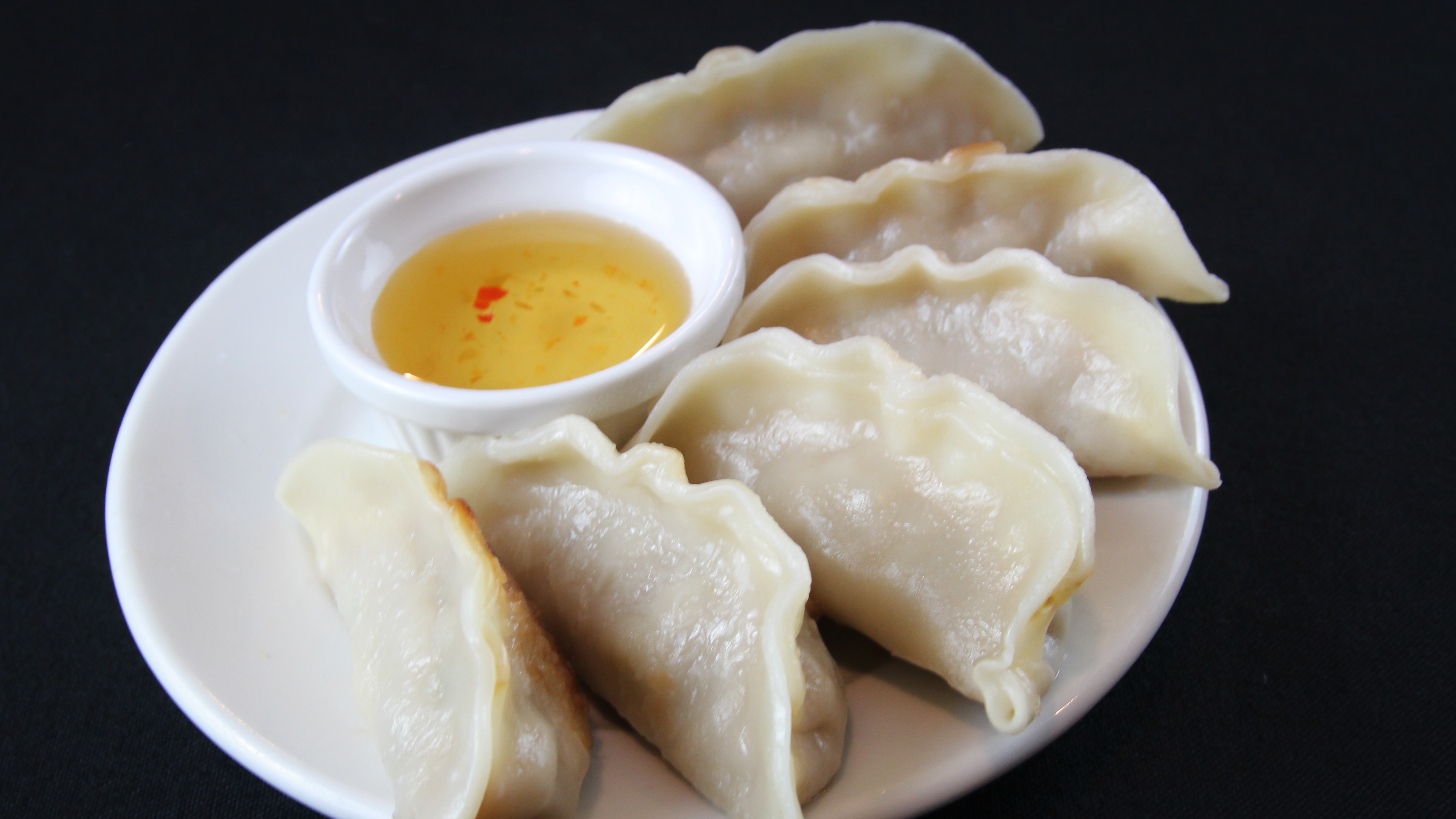 Order Pot Stickers (6) food online from Basil Thai Cafe store, Columbus on bringmethat.com