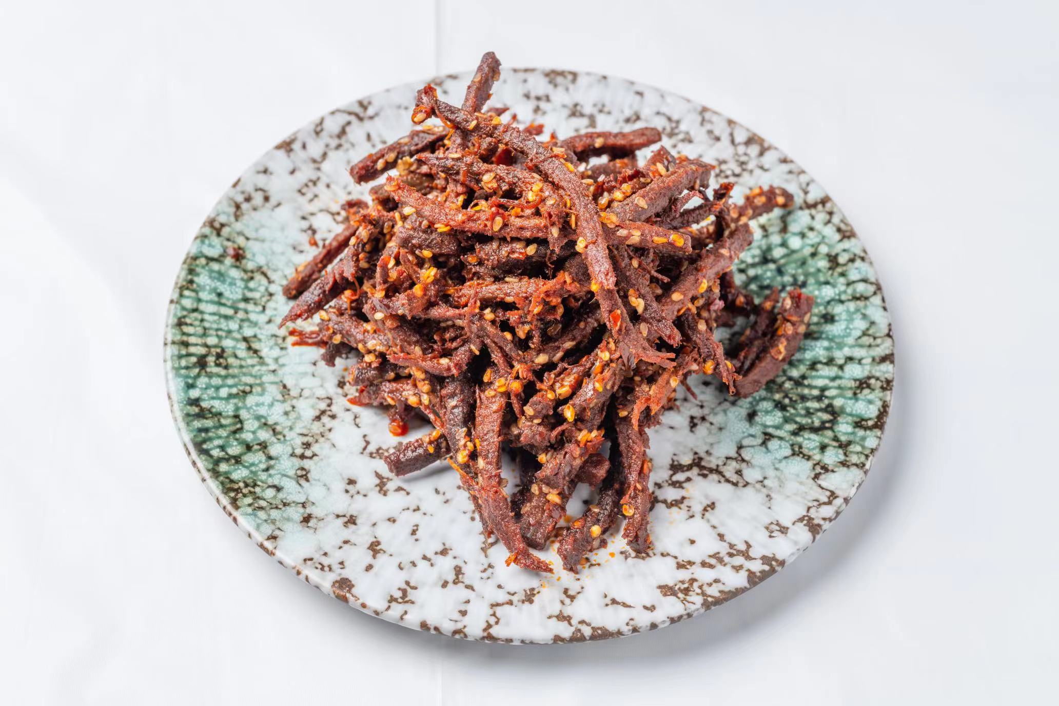 Order Spicy Beef Jerky （贵州麻辣牛肉干） food online from Flower Brook Mifen House store, Flushing on bringmethat.com